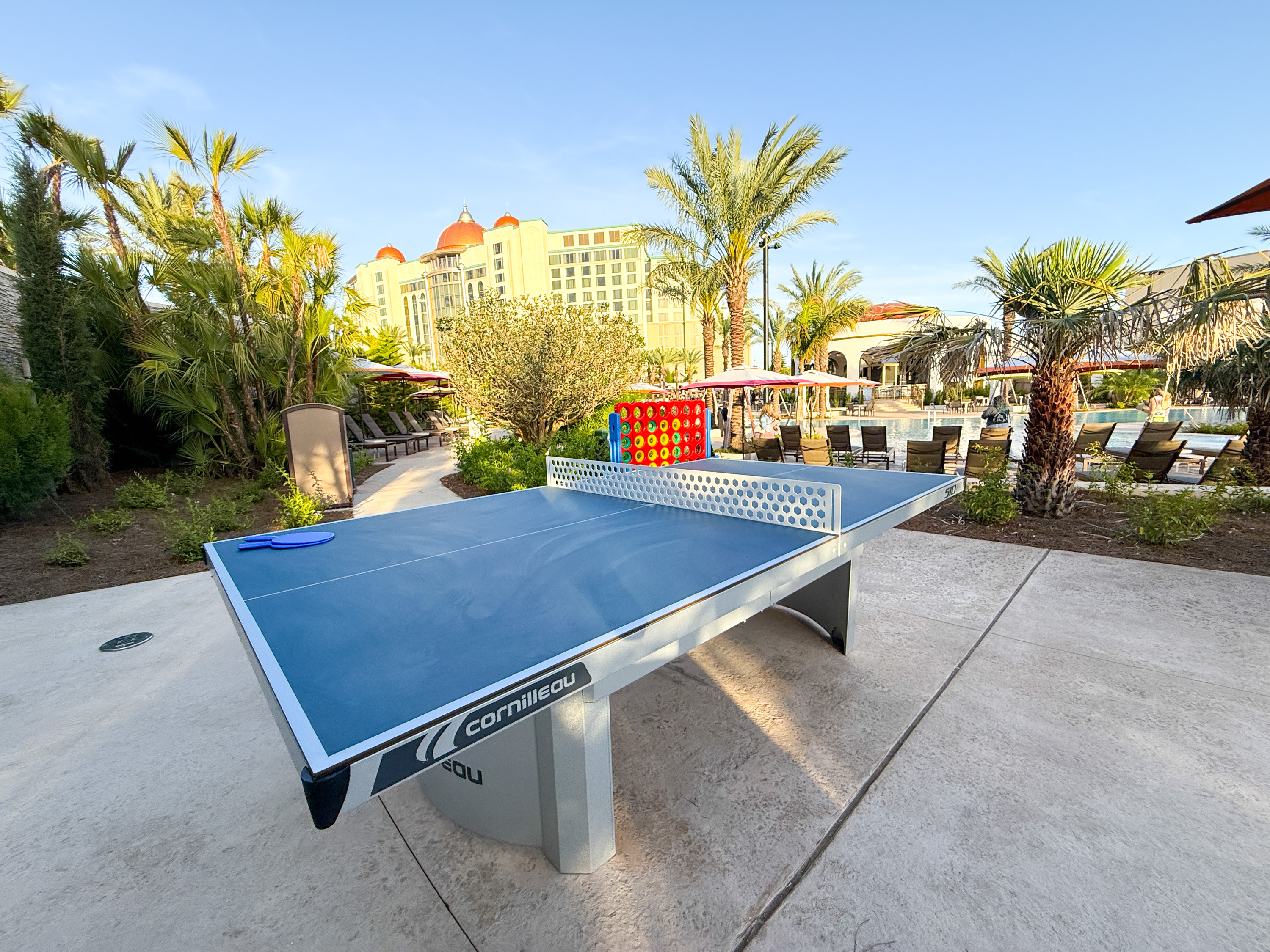 Universal Helios Grand Hotel Loews Hotel Epic Universe pool ping pong Universal Helios Grand Hotel Loews Hotel Epic Universe pool ping pong