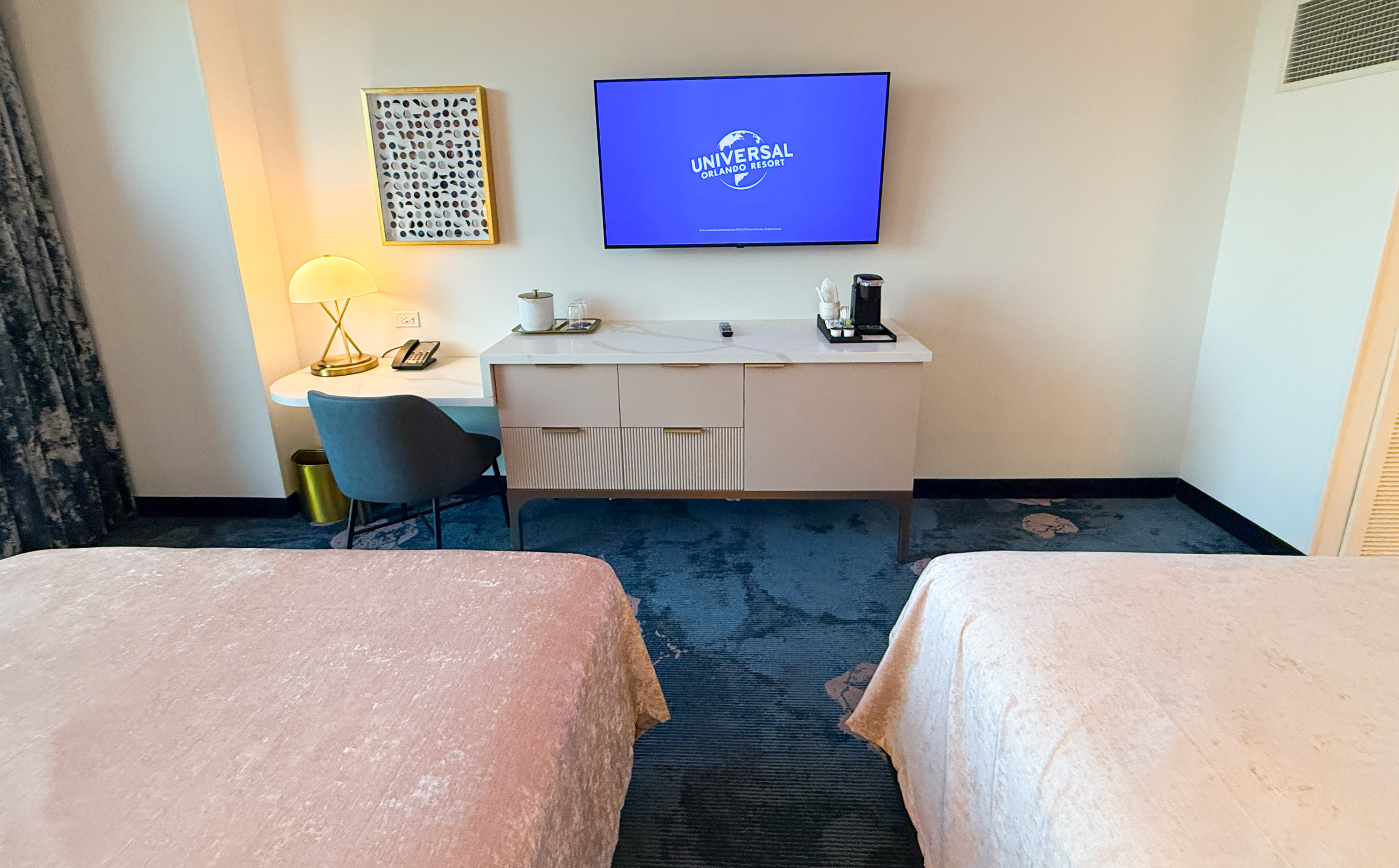 Universal Helios Grand Hotel Loews Hotel Epic Universe room tv Universal Helios Grand Hotel Loews Hotel Epic Universe room tv