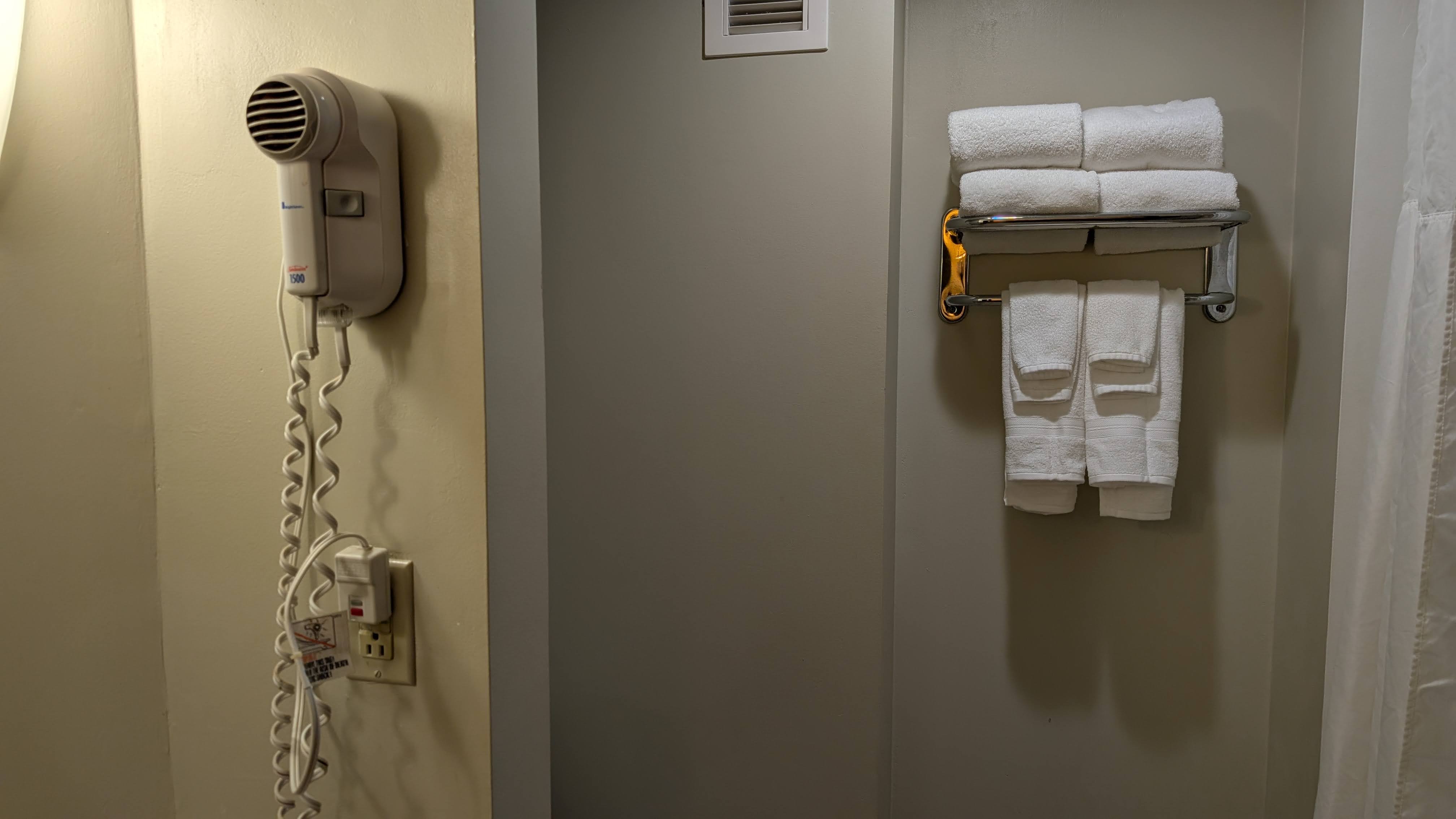 Wyndham Southbury guestroom bathroom hair dryer and towels