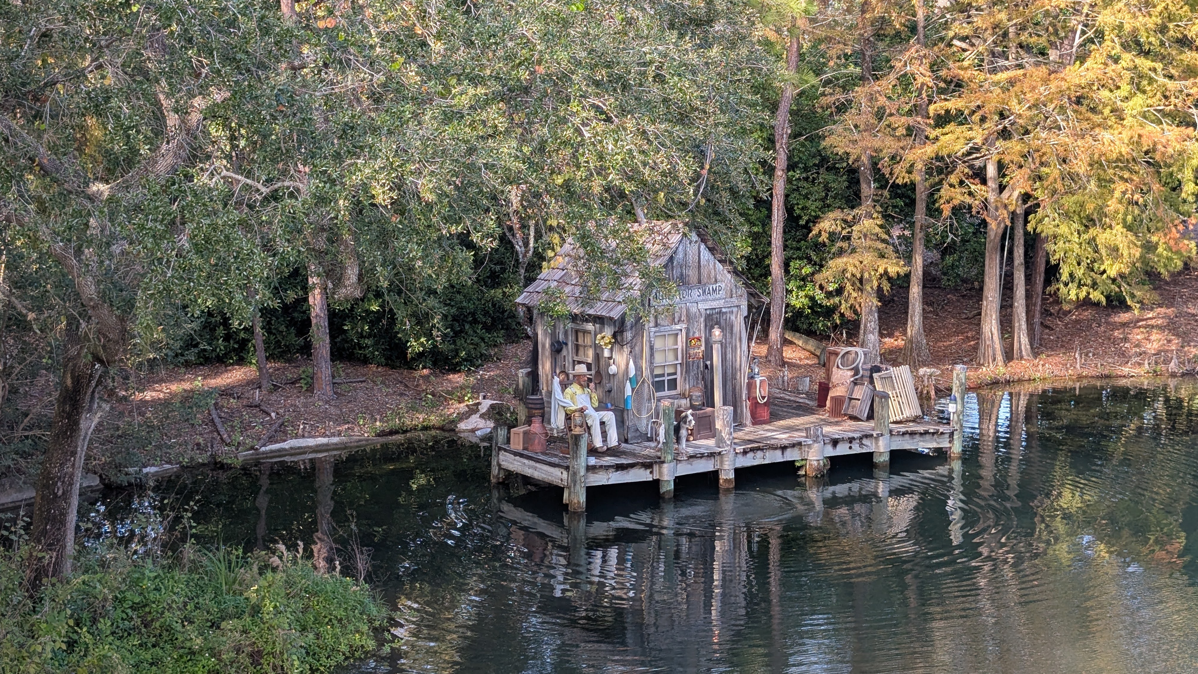 Beacon Joes cabin on Rivers of America Liberty Belle ride at Disney World Magic Kingdom Beacon Joes cabin on Rivers of America Liberty Belle ride at Disney World Magic Kingdom