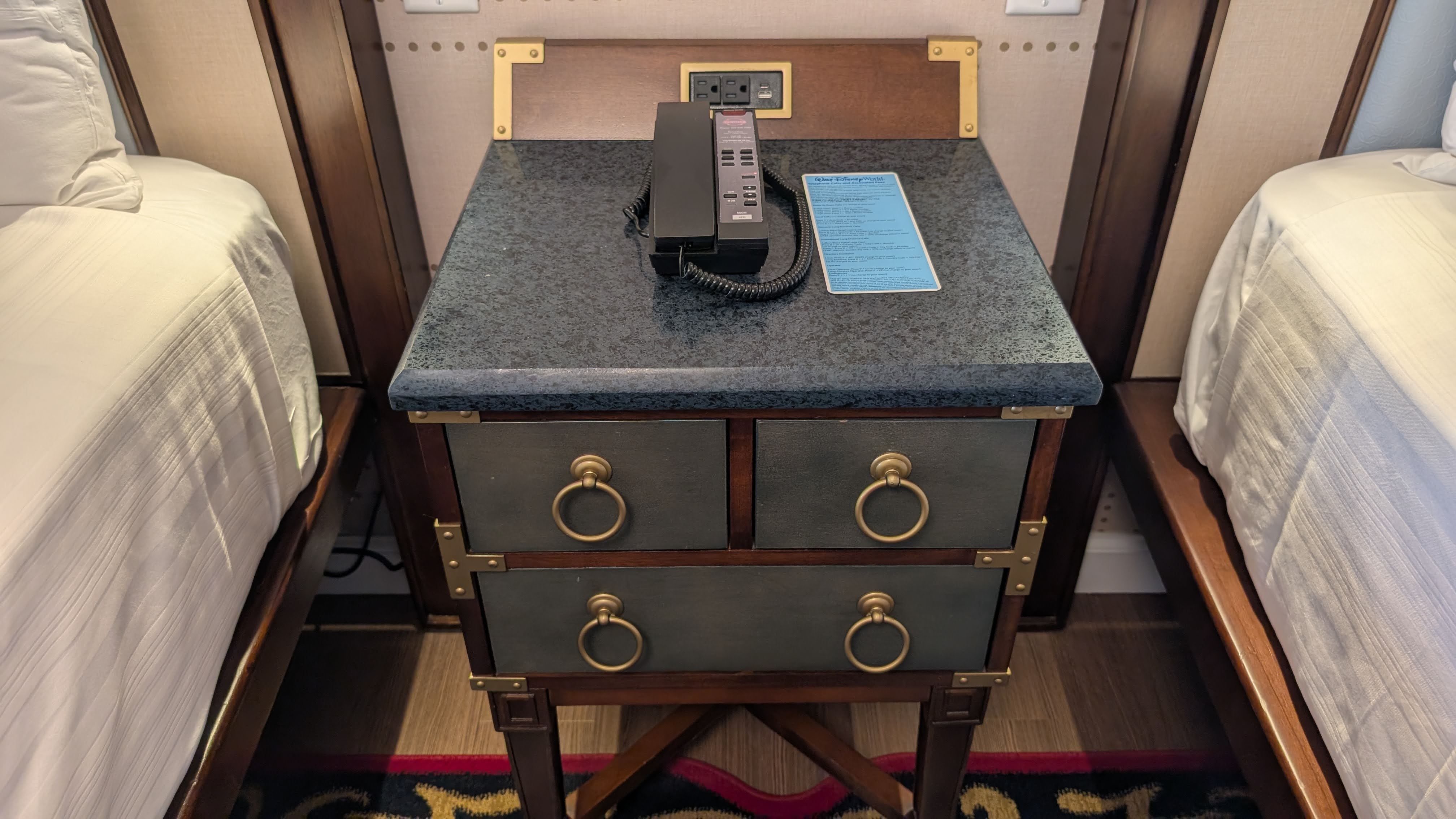 Disneys Yacht Club Resort guest room bed nightstand Disneys Yacht Club Resort guest room bed nightstand