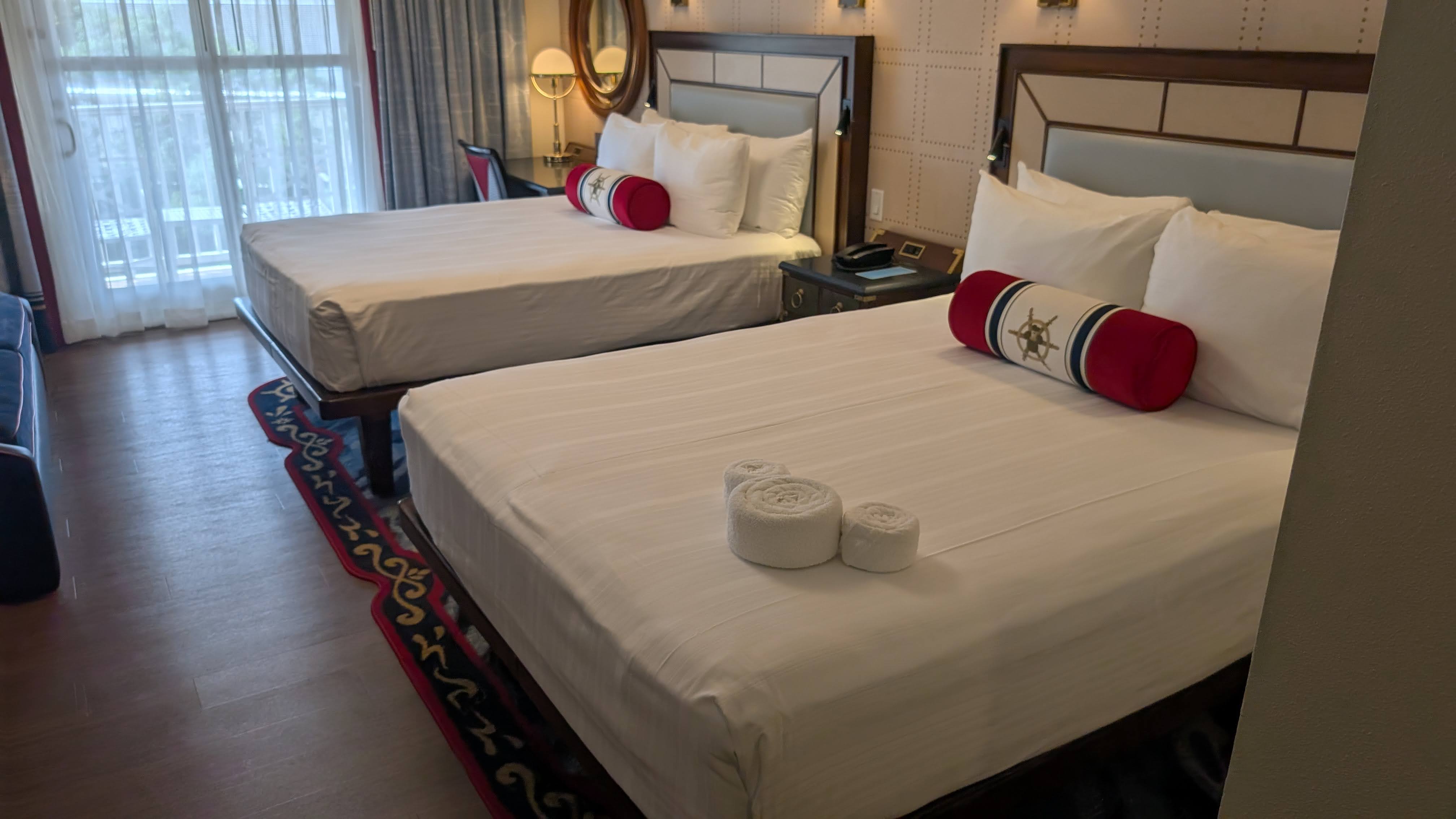 Disneys Yacht Club Resort guest room queen beds Disneys Yacht Club Resort guest room queen beds