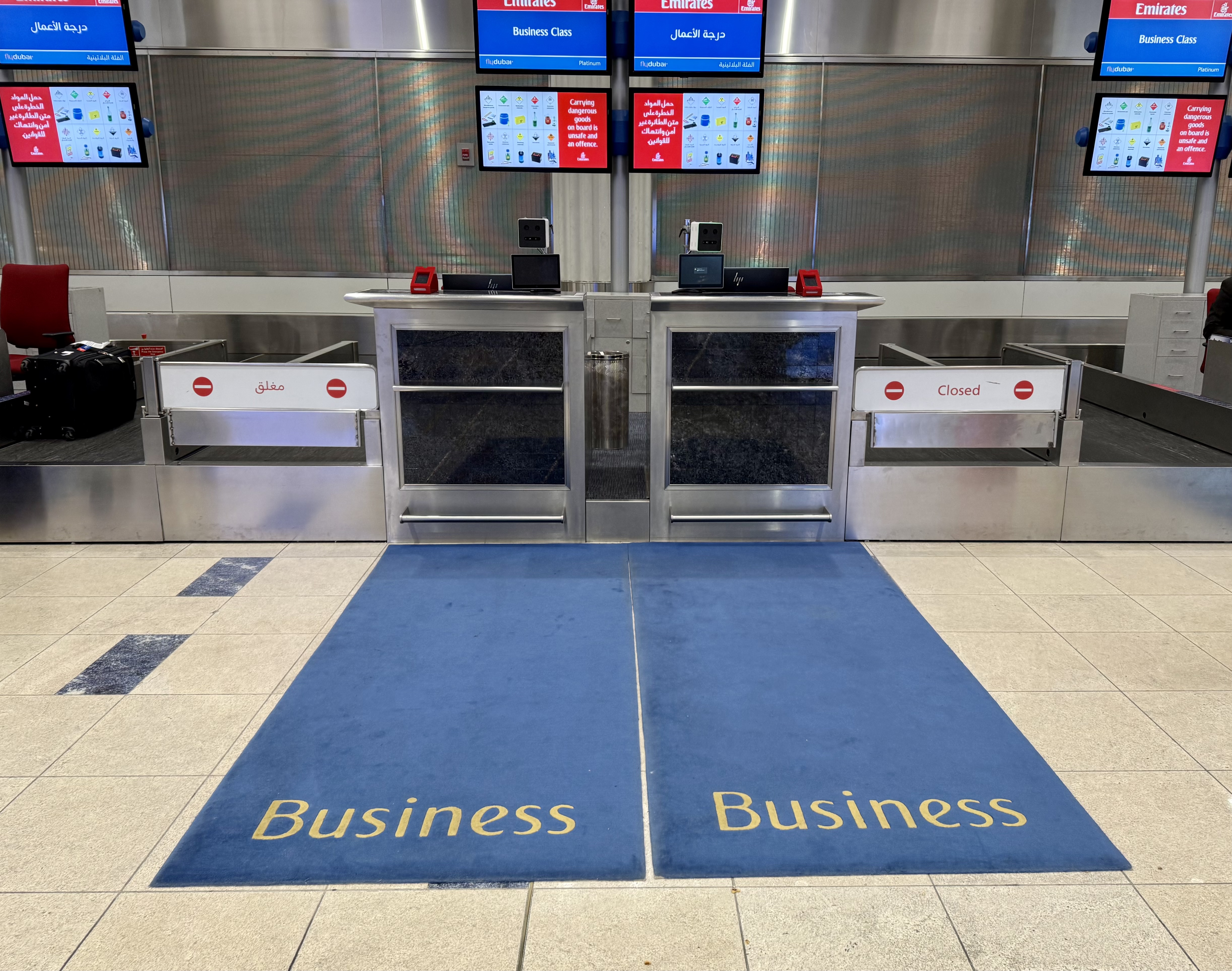 Emirates business class check in at DXB