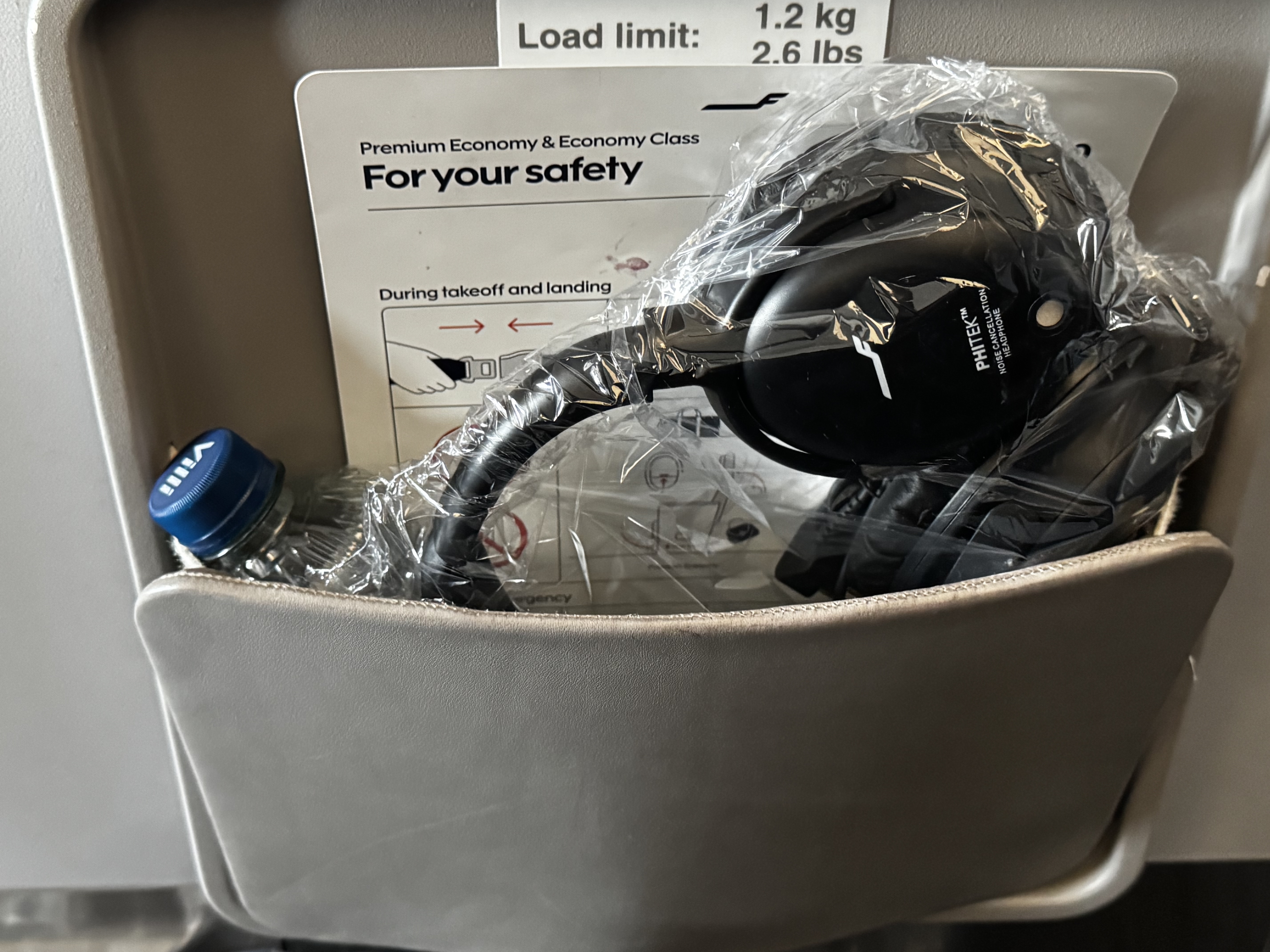 Finnair A350XWB premium economy items in seat pocket Finnair A350XWB premium economy items in seat pocket