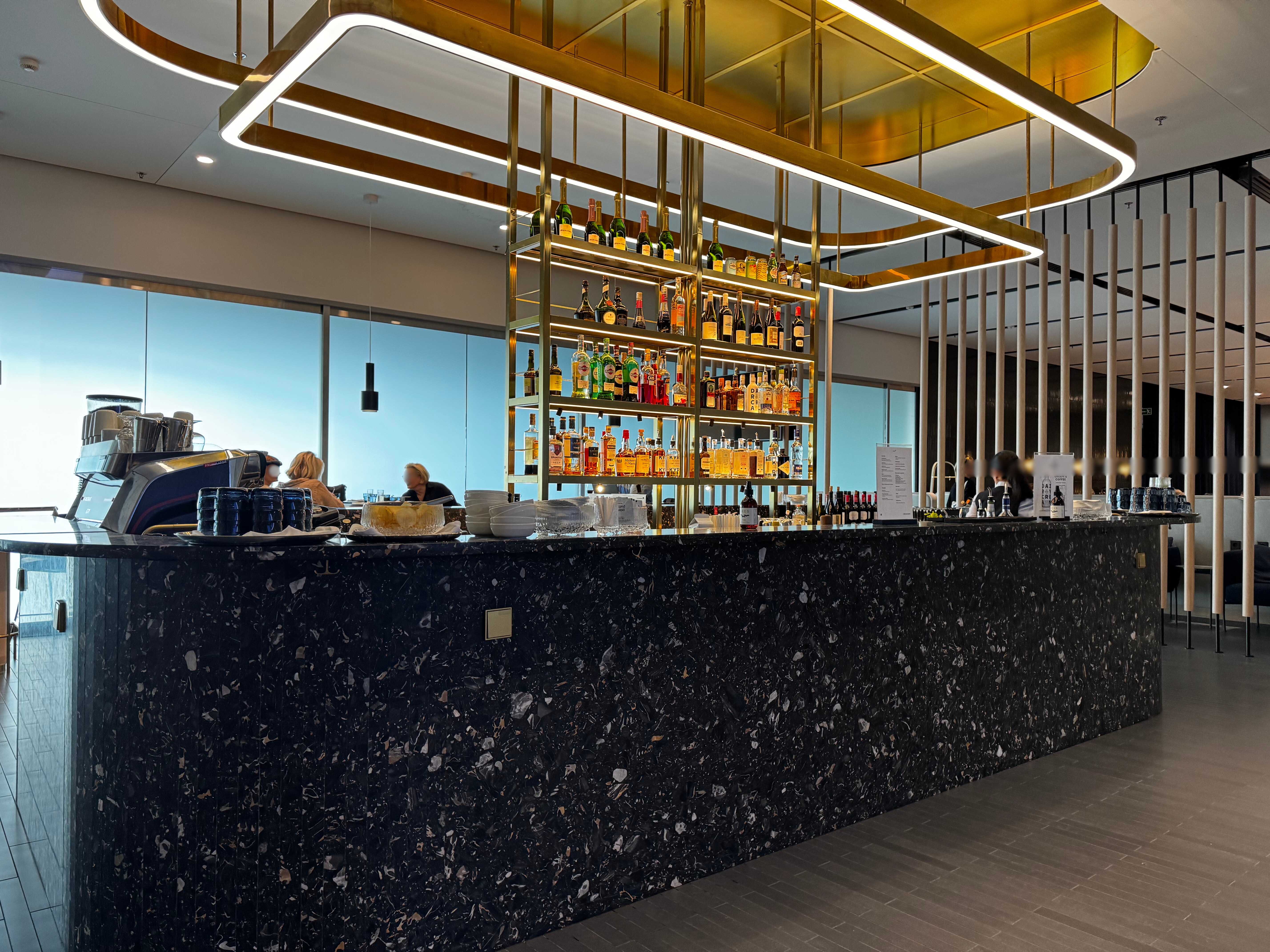 Finnair Lounge Helsinki HEL Non Schengen Platinum Wing bar blurred