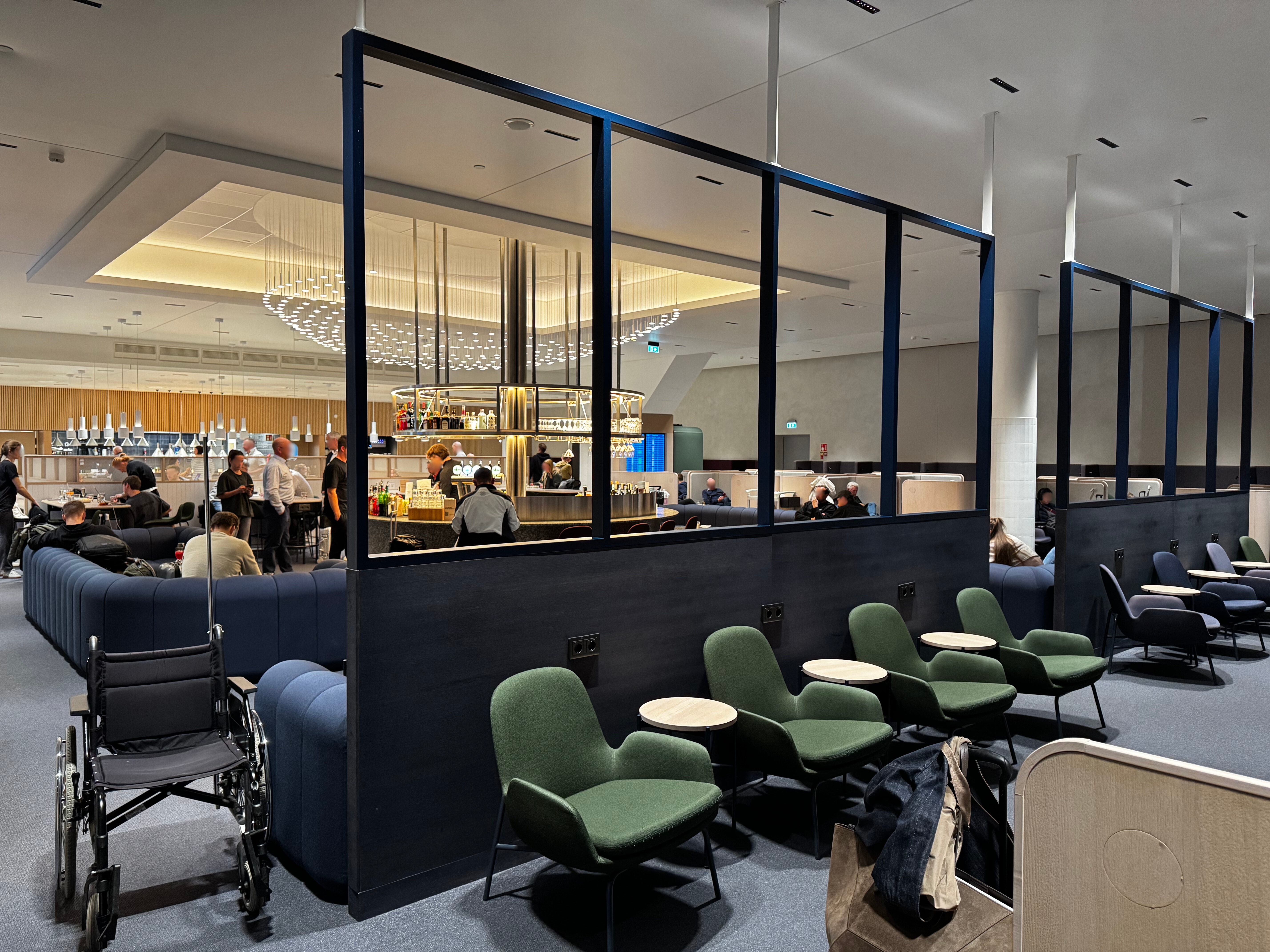 Finnair Lounge Helsinki HEL Non Schengen bar seating blurred