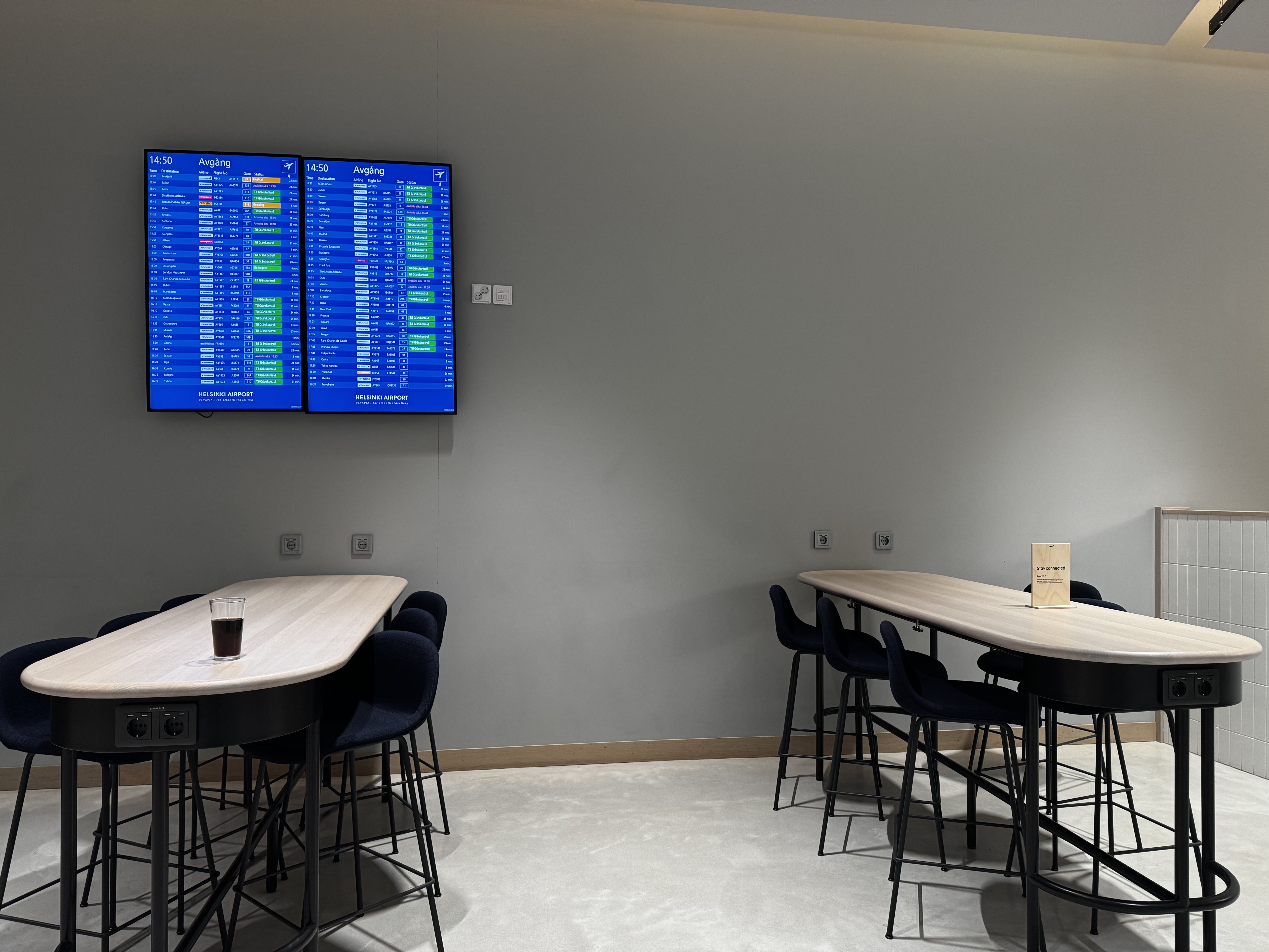 Finnair Lounge Helsinki HEL Non Schengen tables departure boards