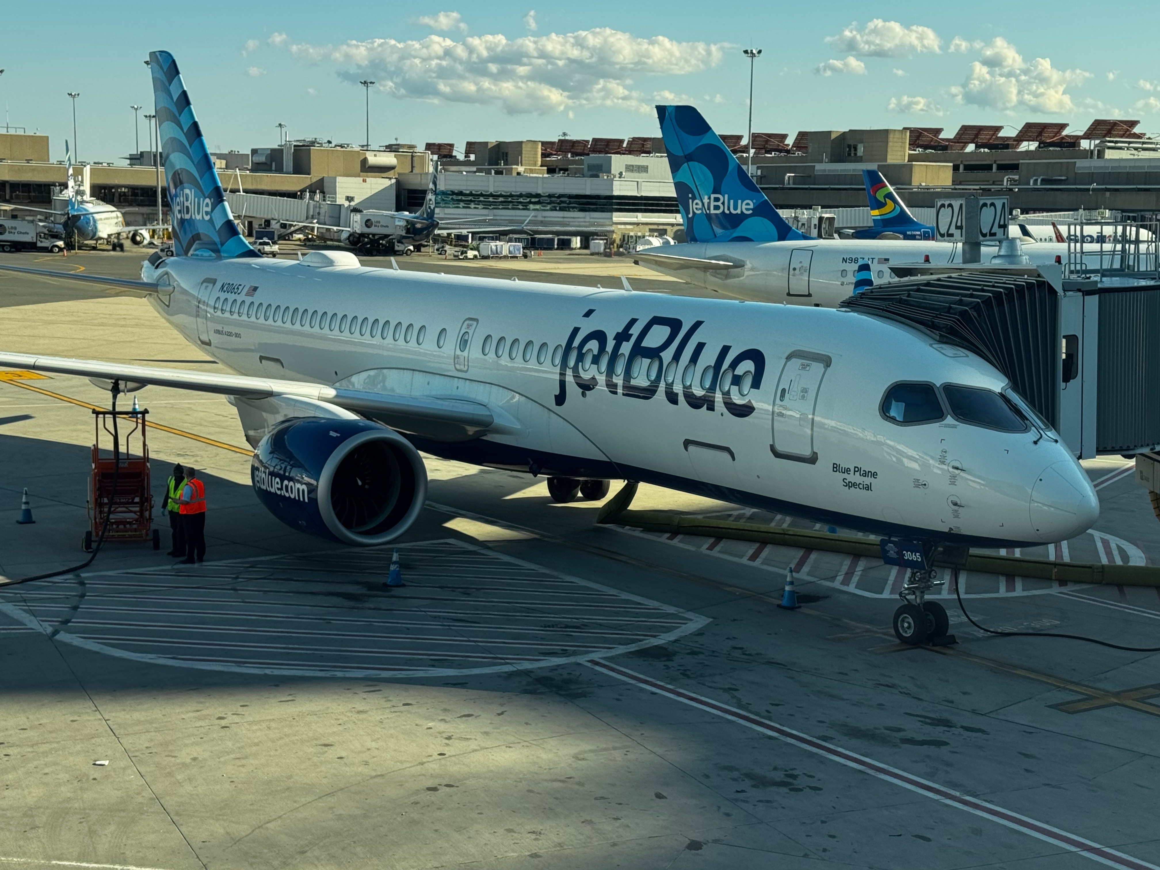 JetBlue Airbus A220 plane at gate BOS airport JetBlue Airbus A220 plane at gate BOS airport