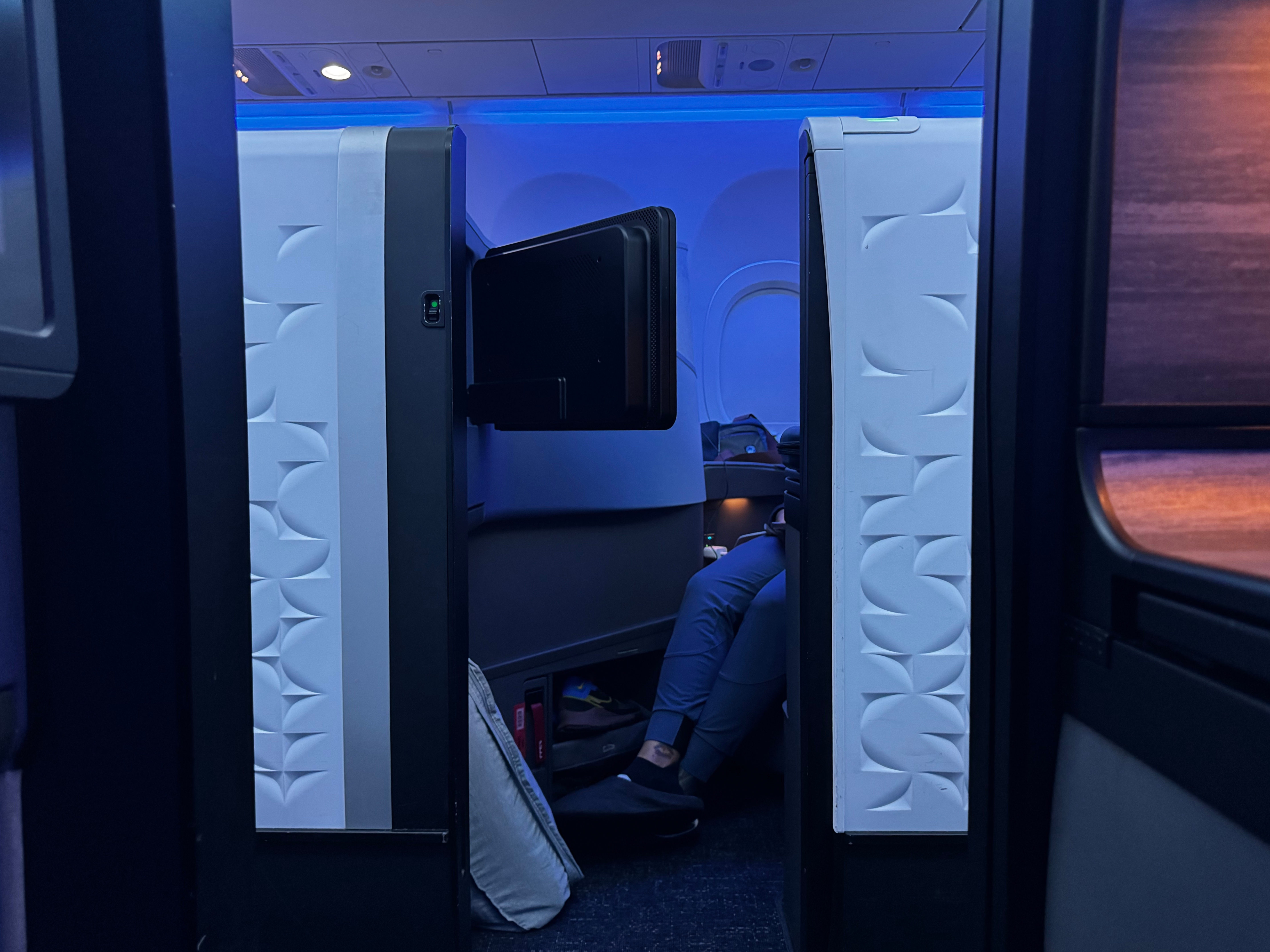 JetBlue Mint A321XLR BOS MAD view through suite door JetBlue Mint A321XLR BOS MAD view through suite door