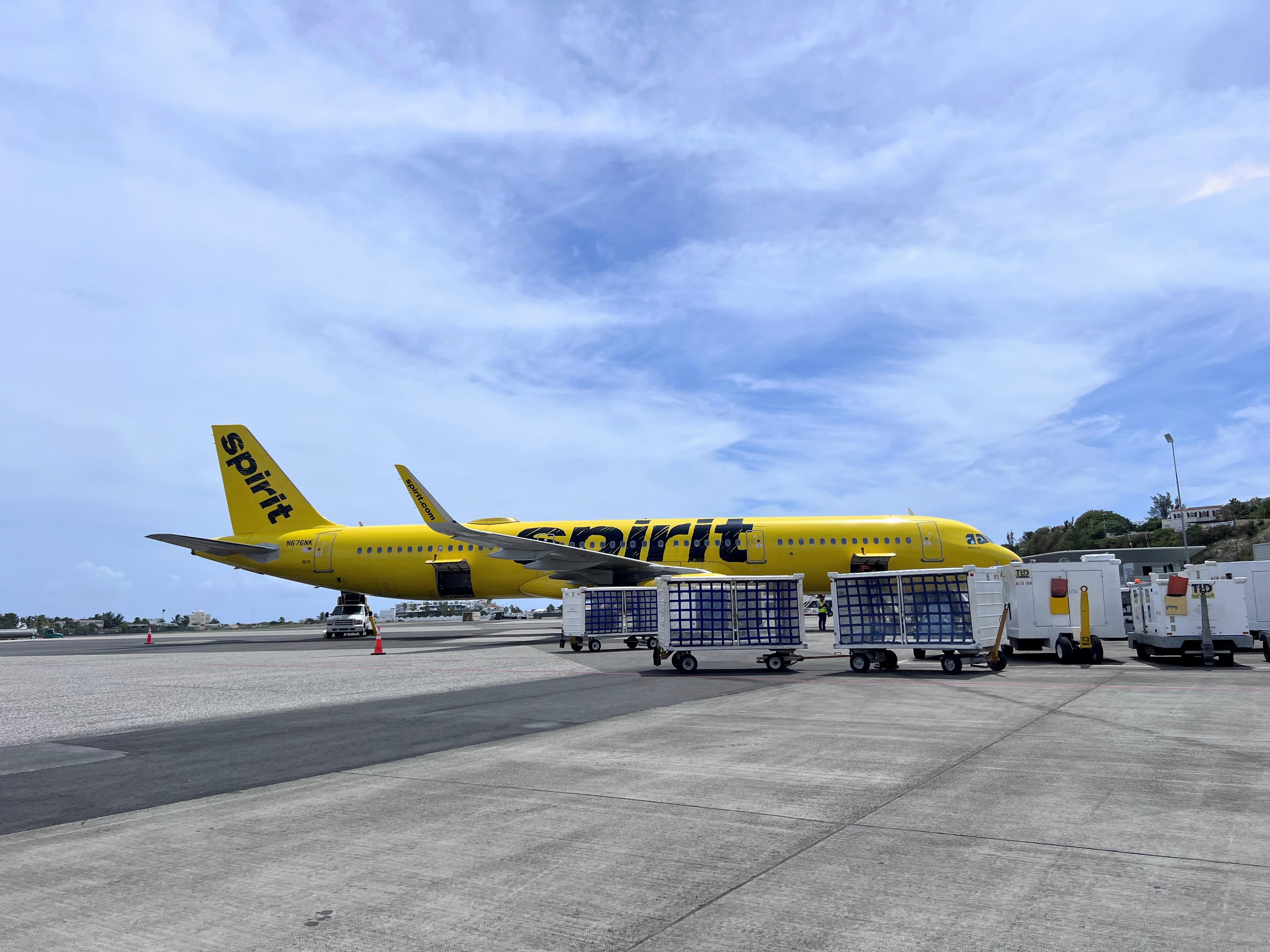 Spirit Airlines plane and baggage carts