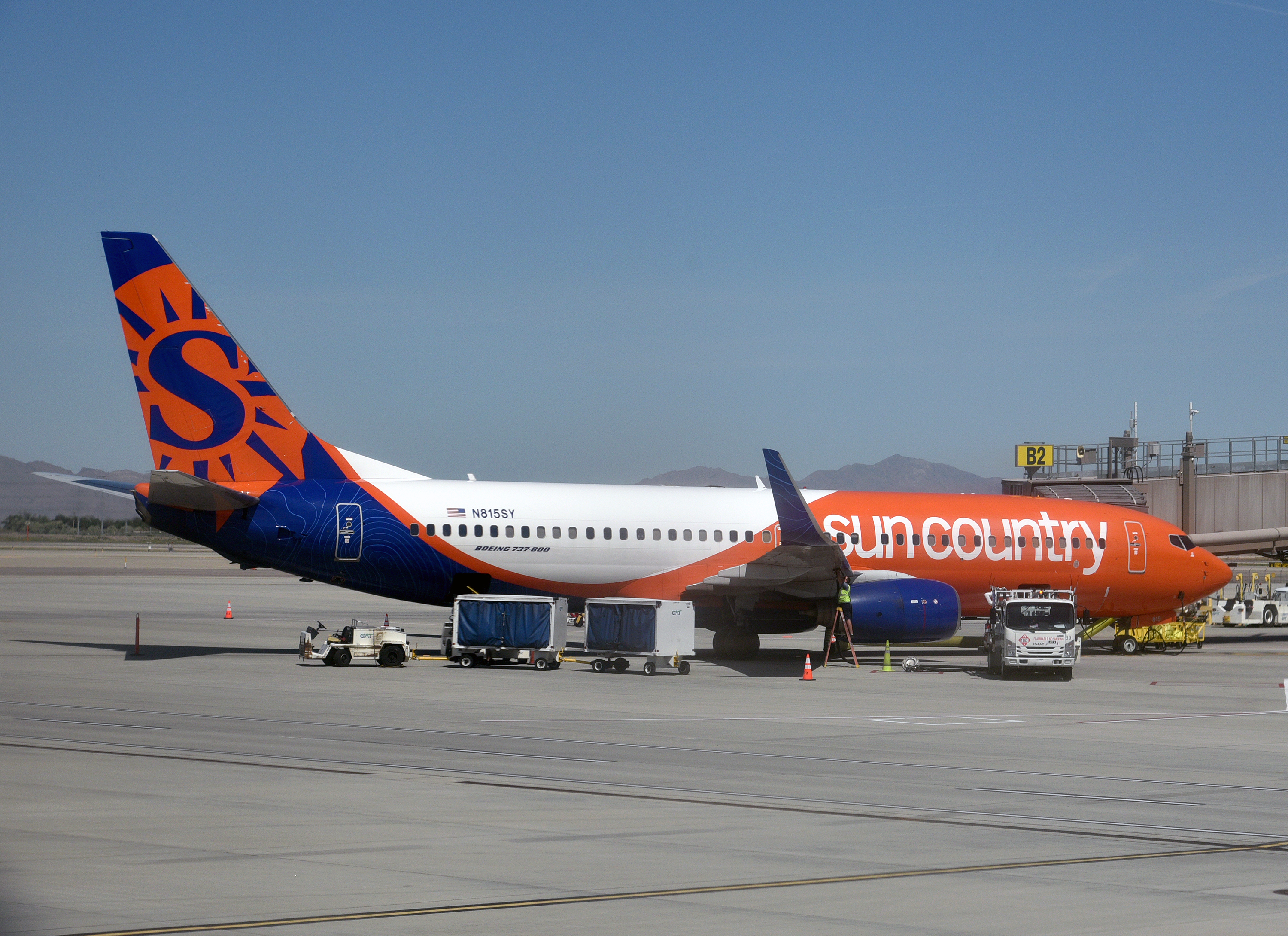 Sun Country B737 800 docked being refueled SLC