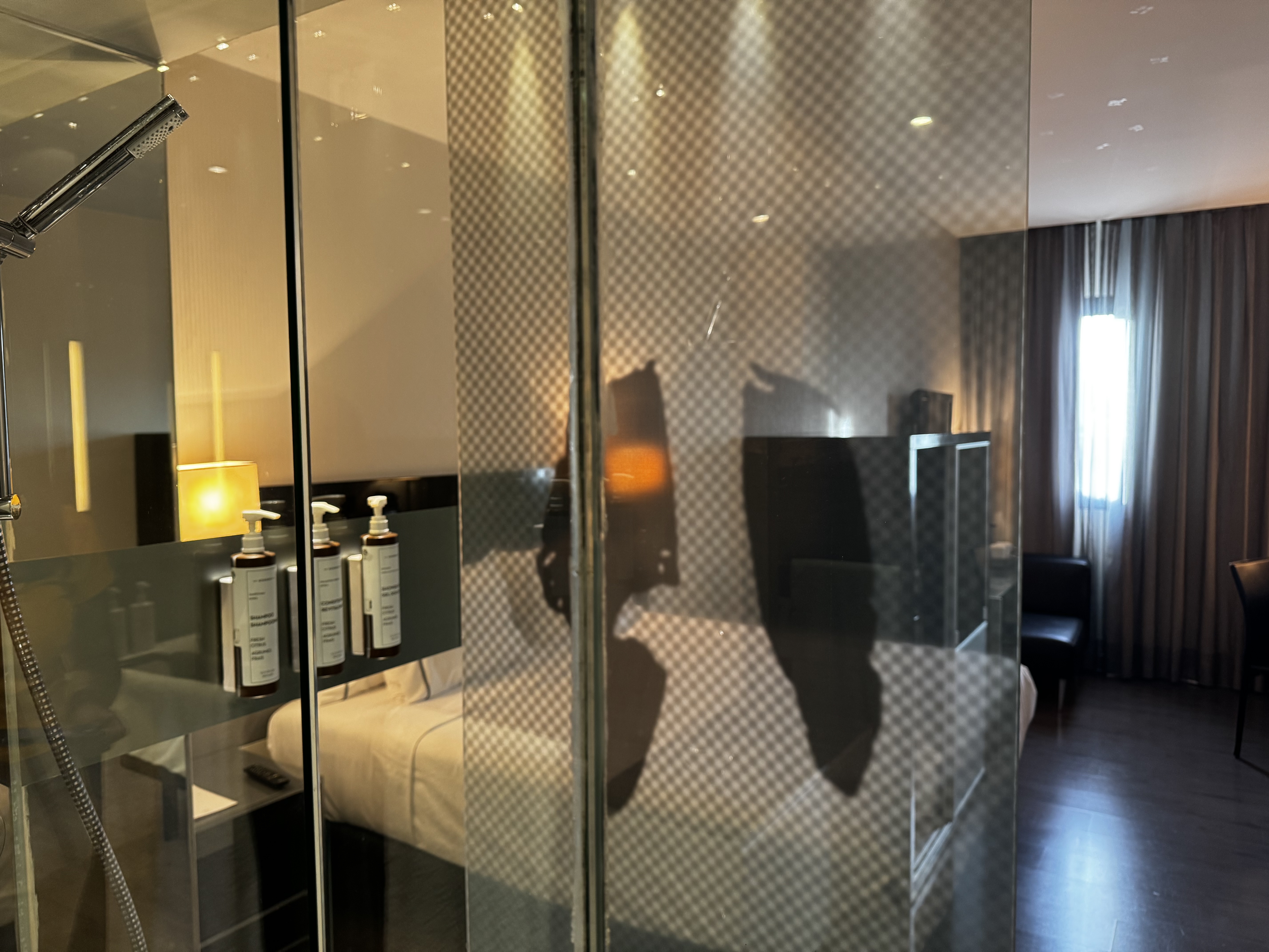 AC Hotel Murcia bathroom view through shower