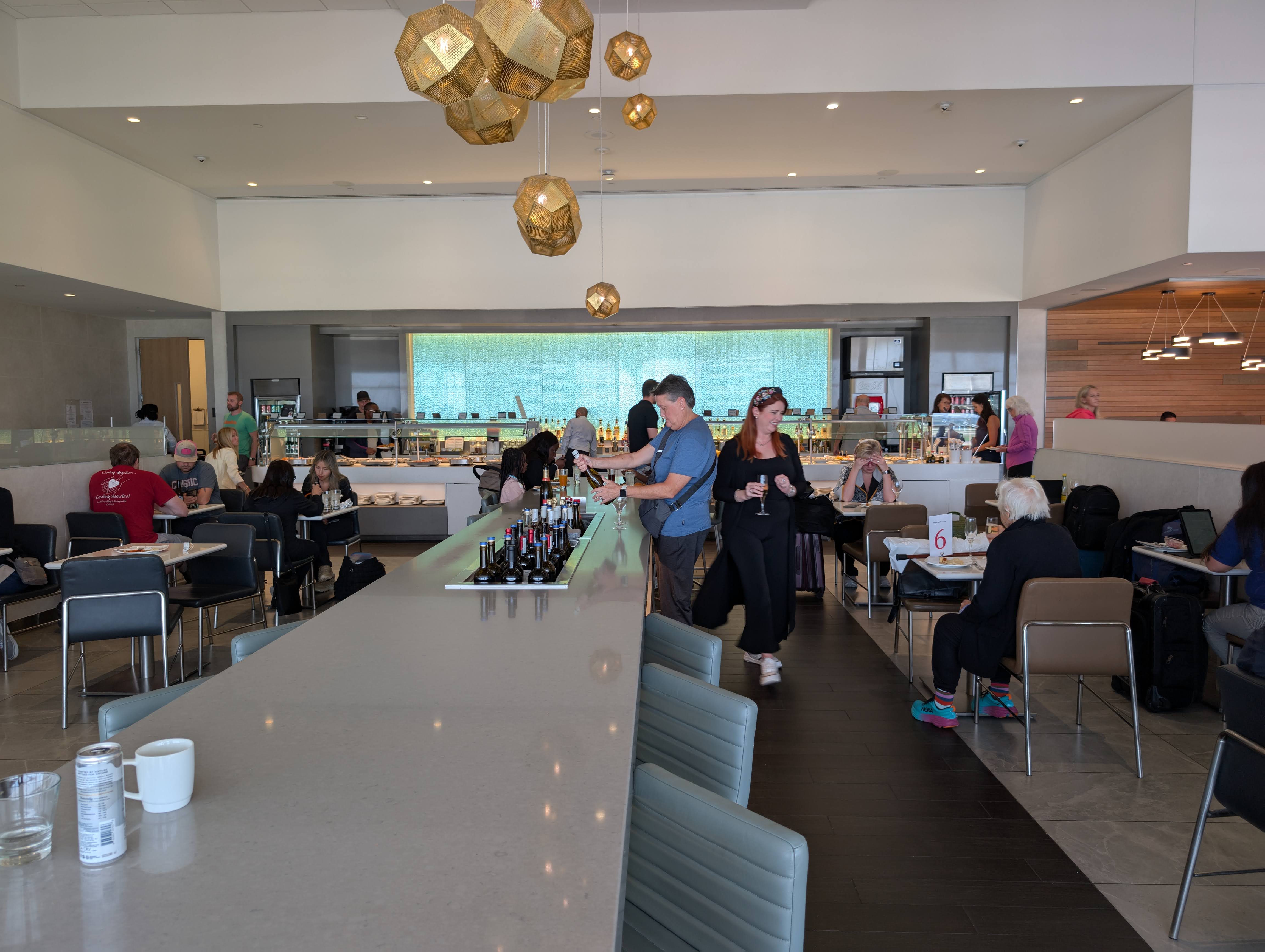 American Airlines Flagship Lounge DFW buffet seating bar American Airlines Flagship Lounge DFW buffet seating bar