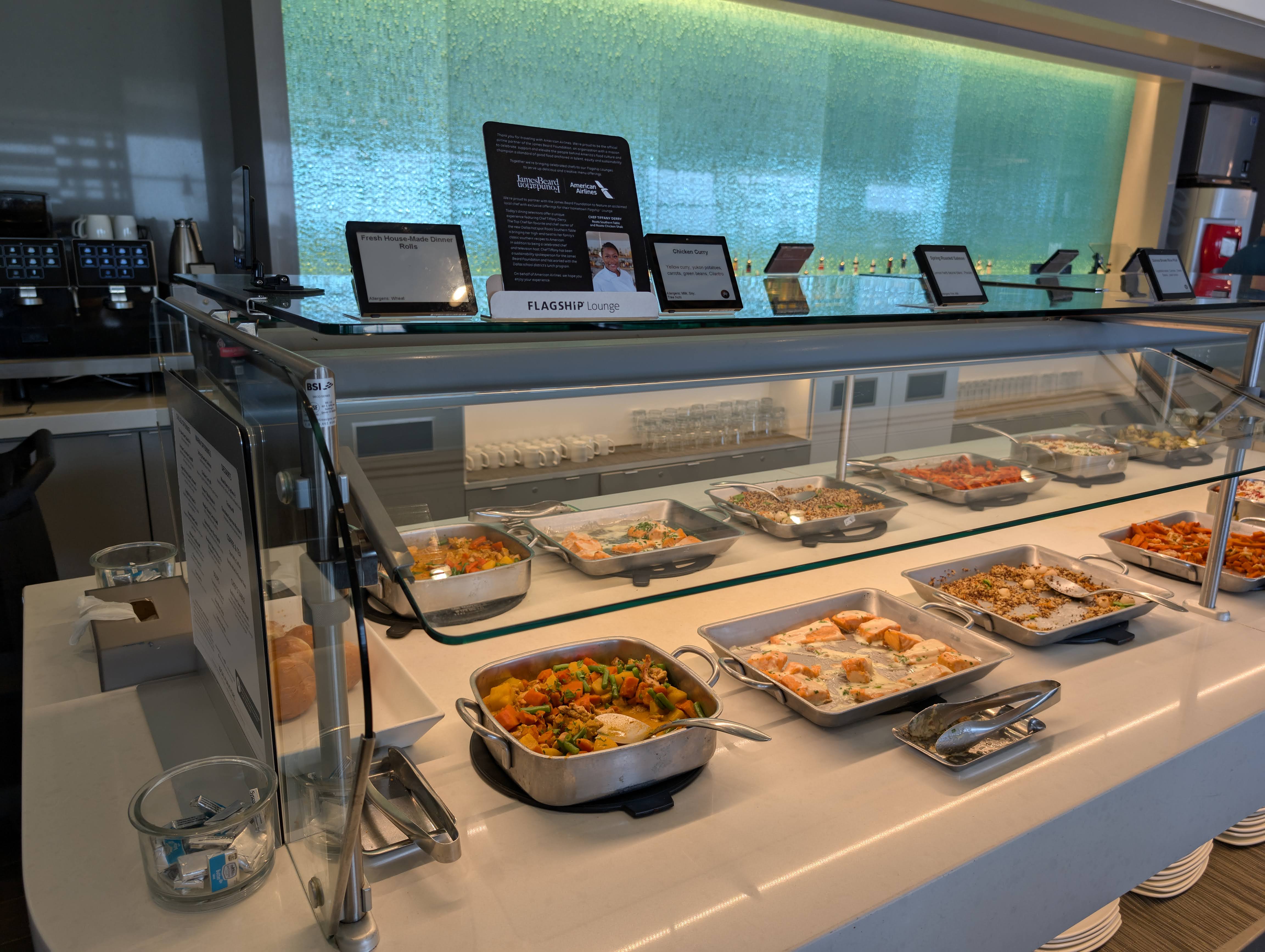 American Airlines Flagship Lounge DFW hot buffet mains American Airlines Flagship Lounge DFW hot buffet mains