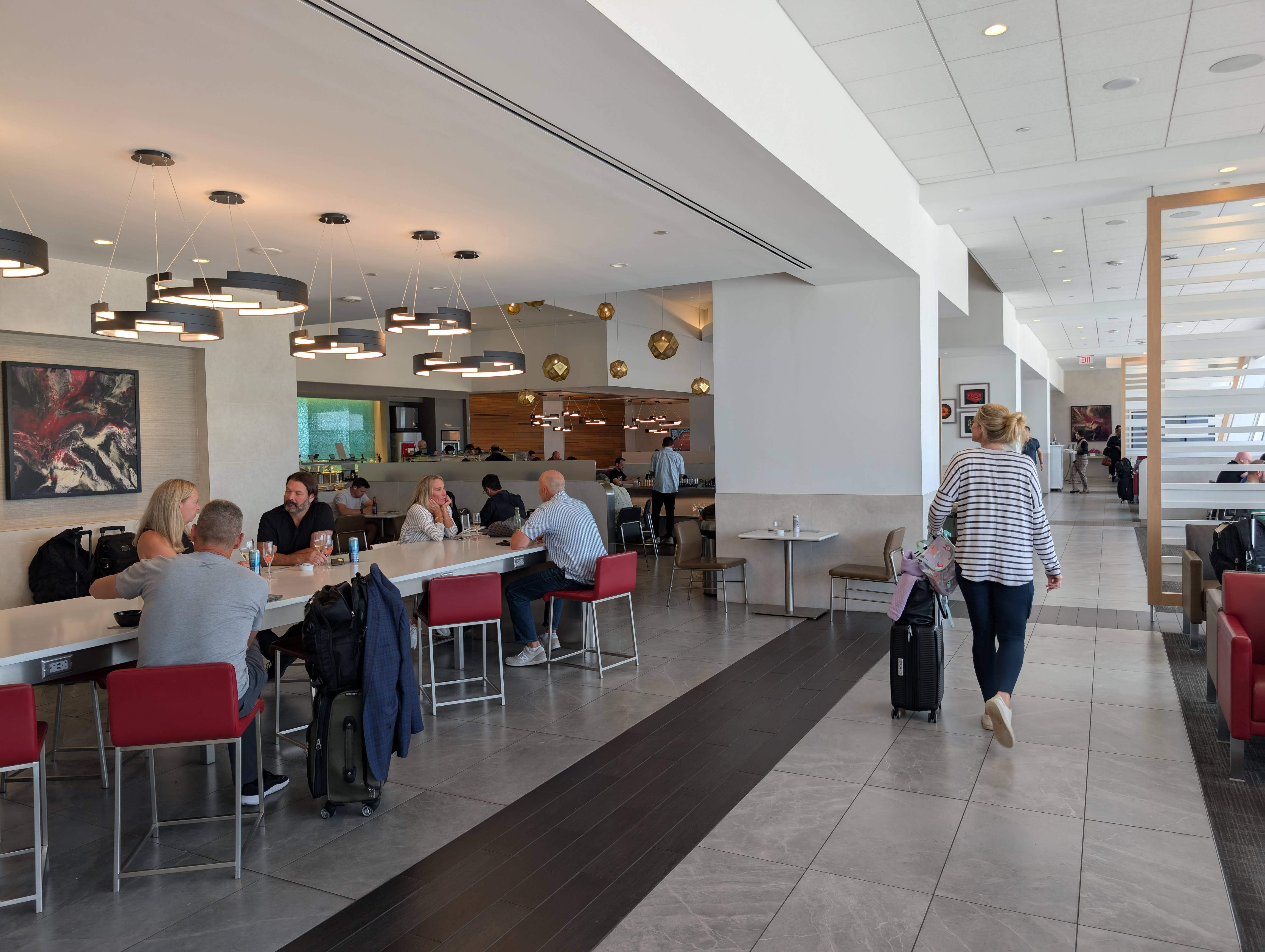 American Airlines Flagship Lounge DFW long bar American Airlines Flagship Lounge DFW long bar