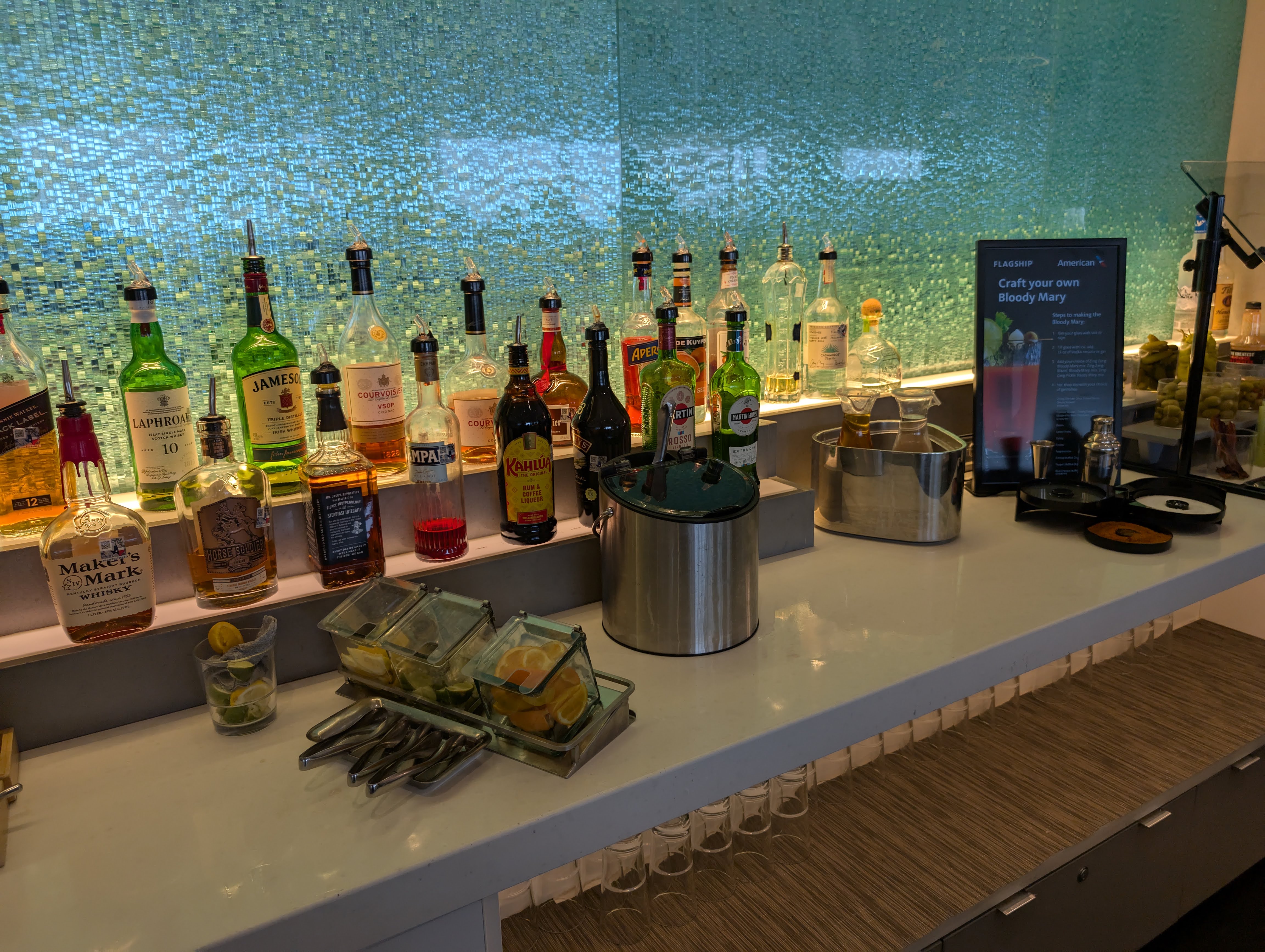 American Airlines Flagship Lounge DFW self serve bar bottles American Airlines Flagship Lounge DFW self serve bar bottles