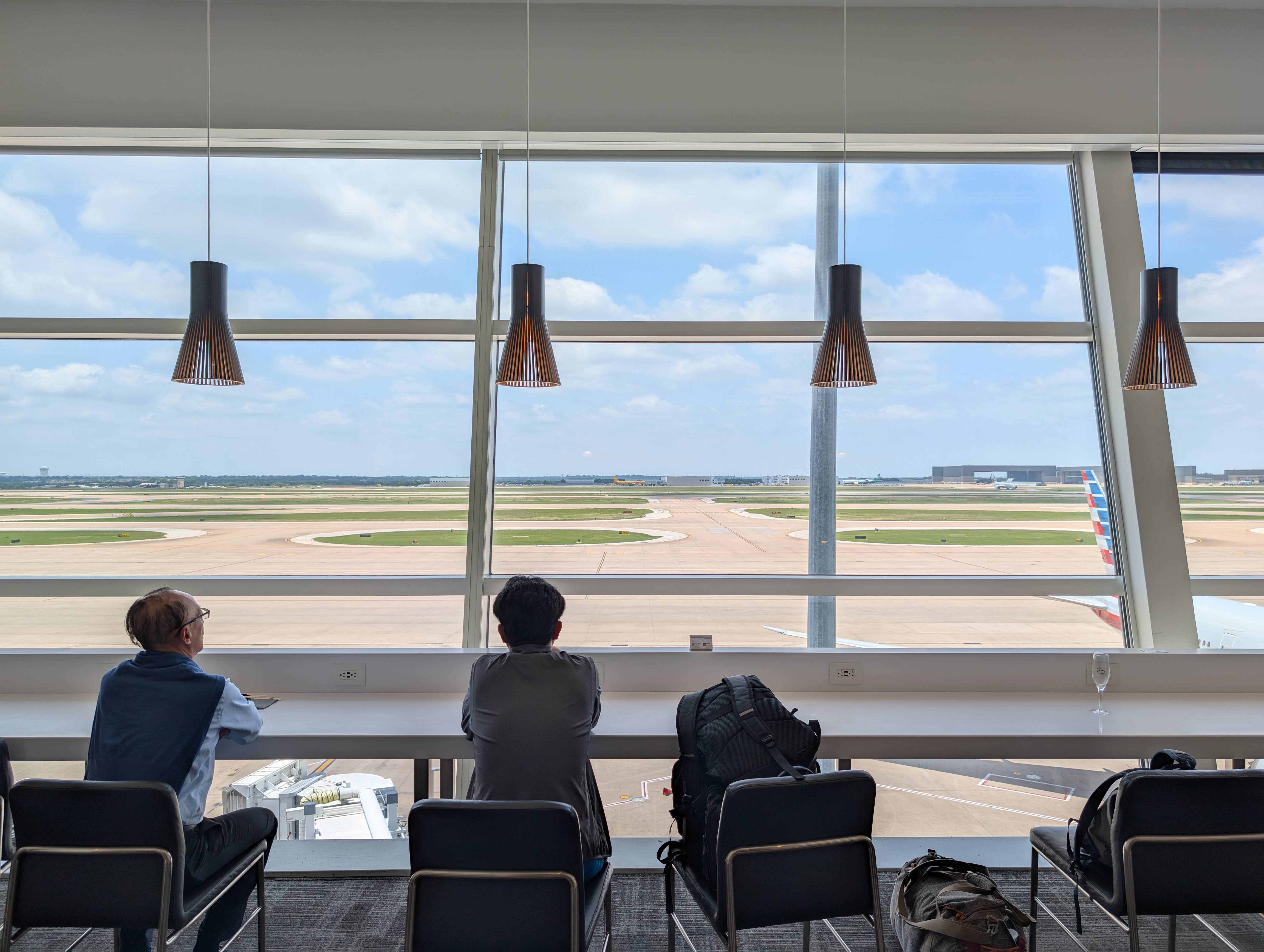 American Airlines Flagship Lounge DFW window seating view American Airlines Flagship Lounge DFW window seating view