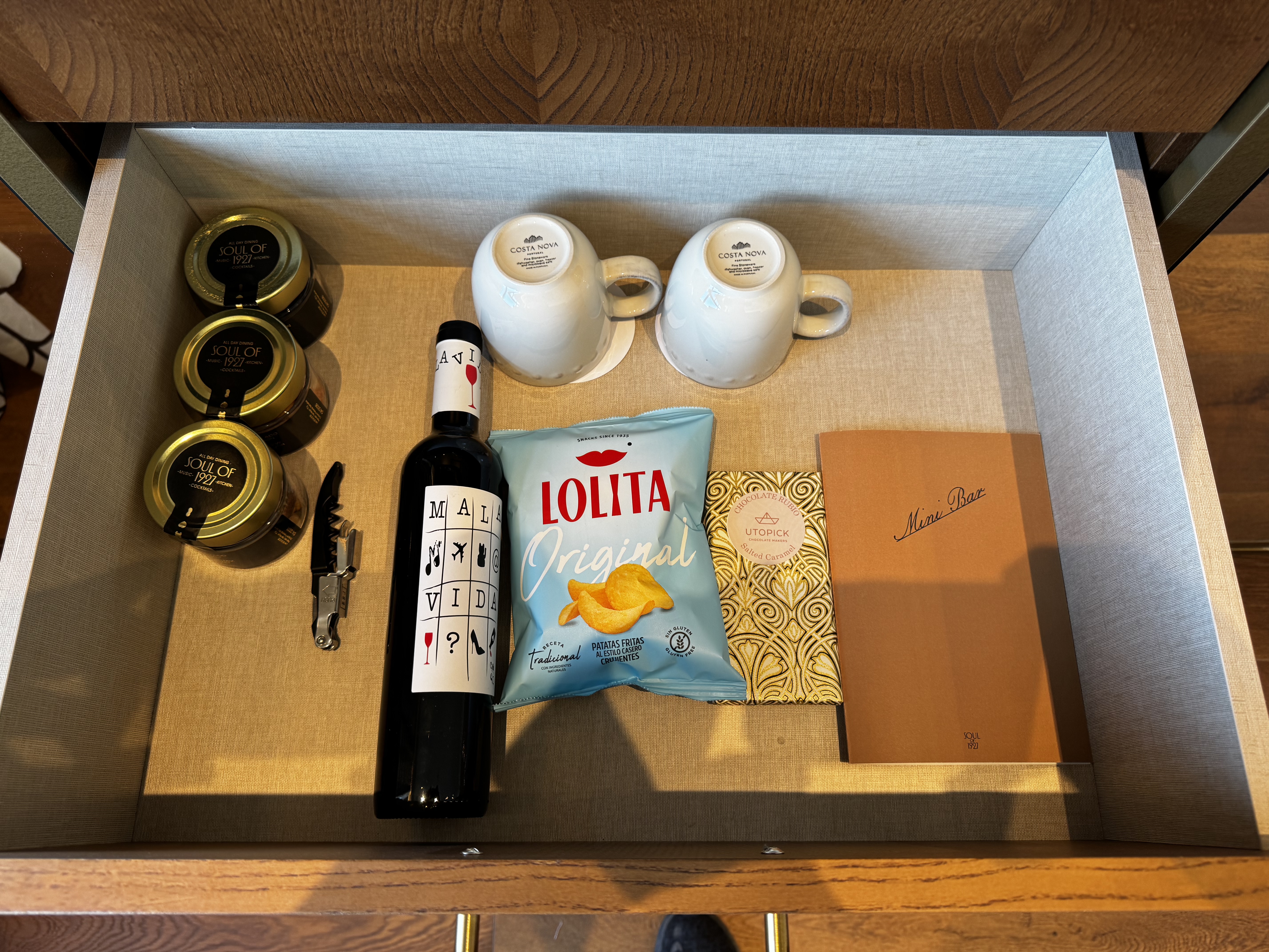 Grand Hotel Centenari Valencia Marriott Autograph Collection bedroom wine spreads drawer