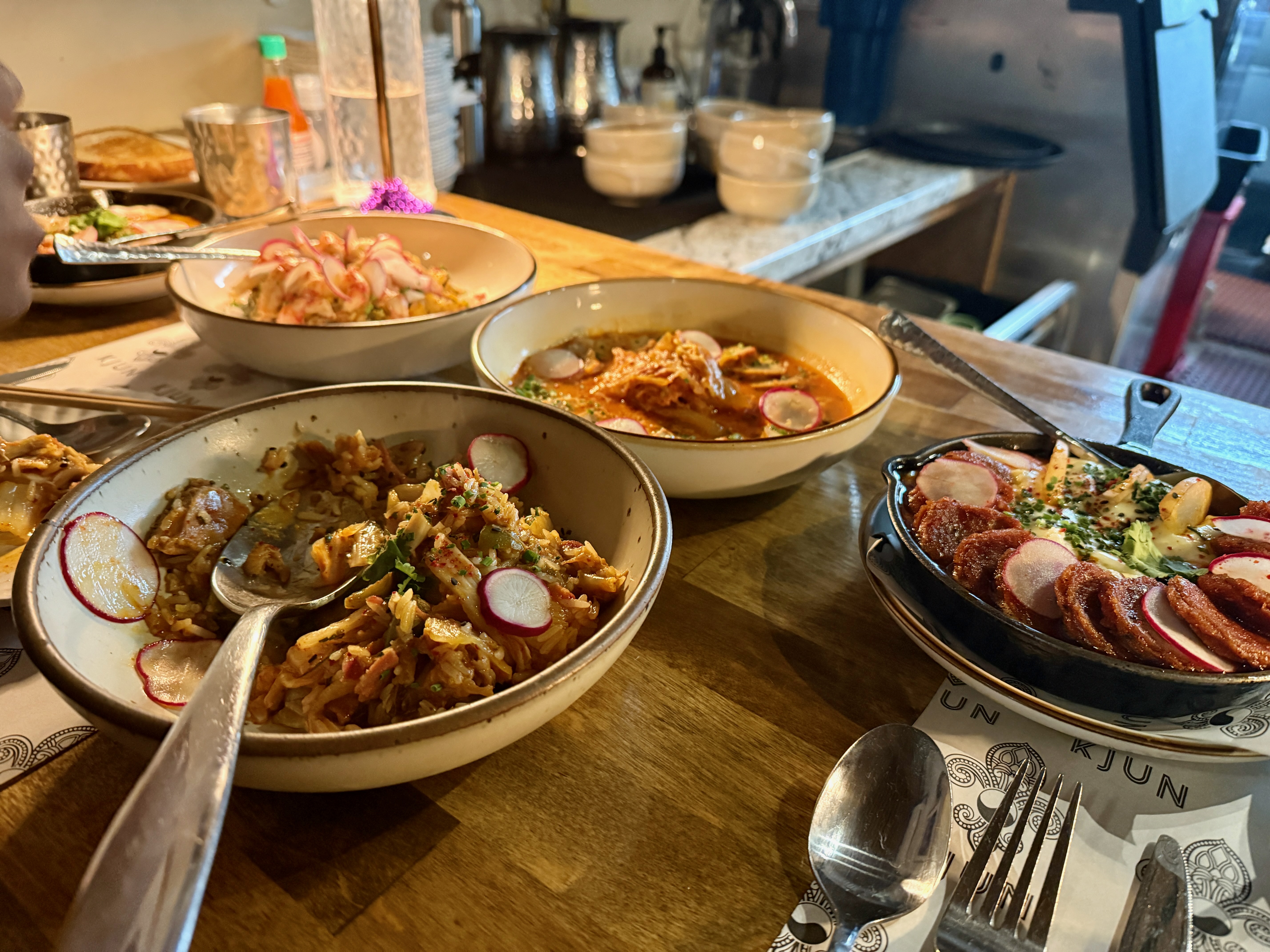 Plates of food on a table at a restaurant