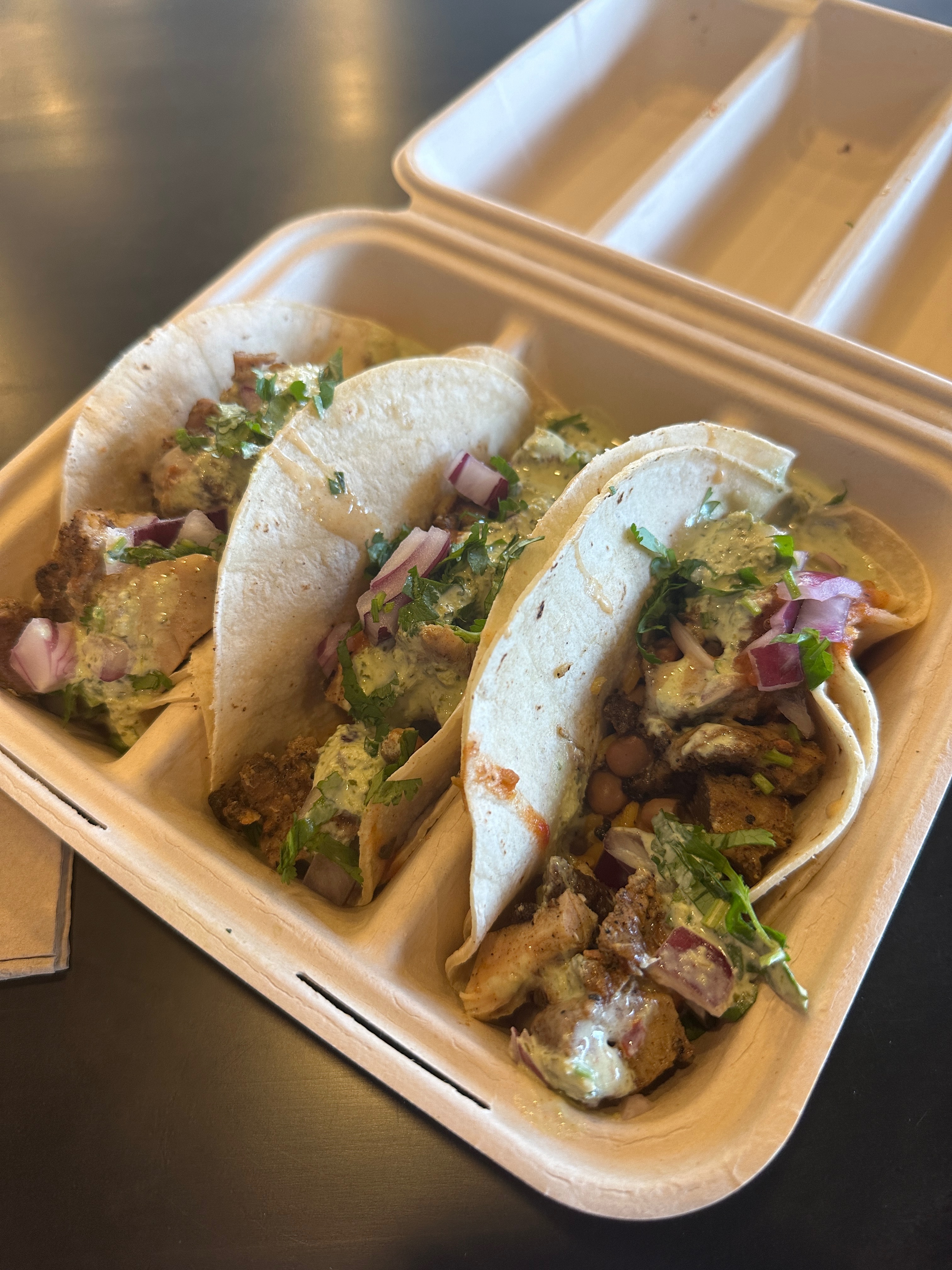 Tacos in a to go container Tacos in a to go container