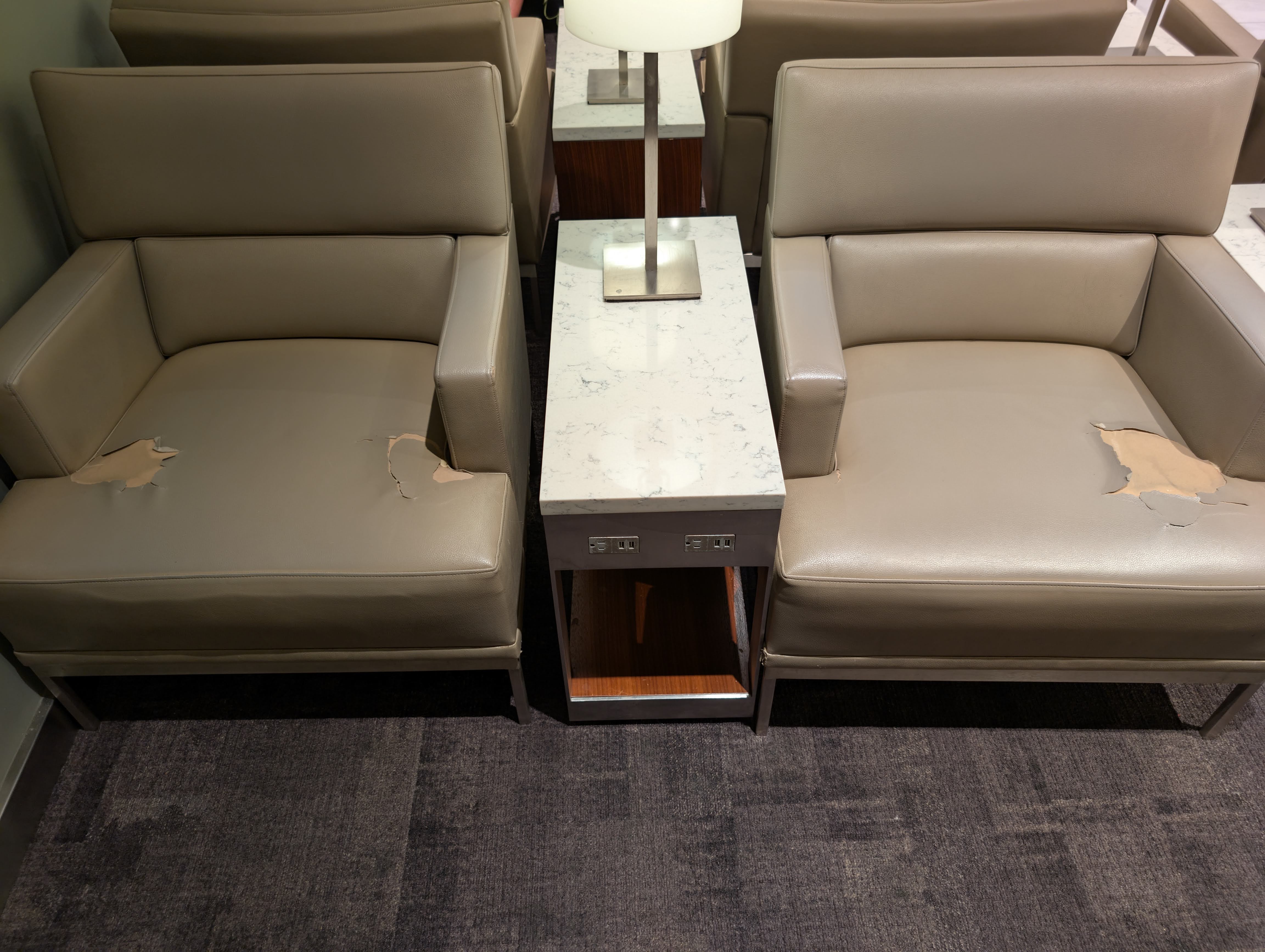 United Club FLL seating ripped armchairs