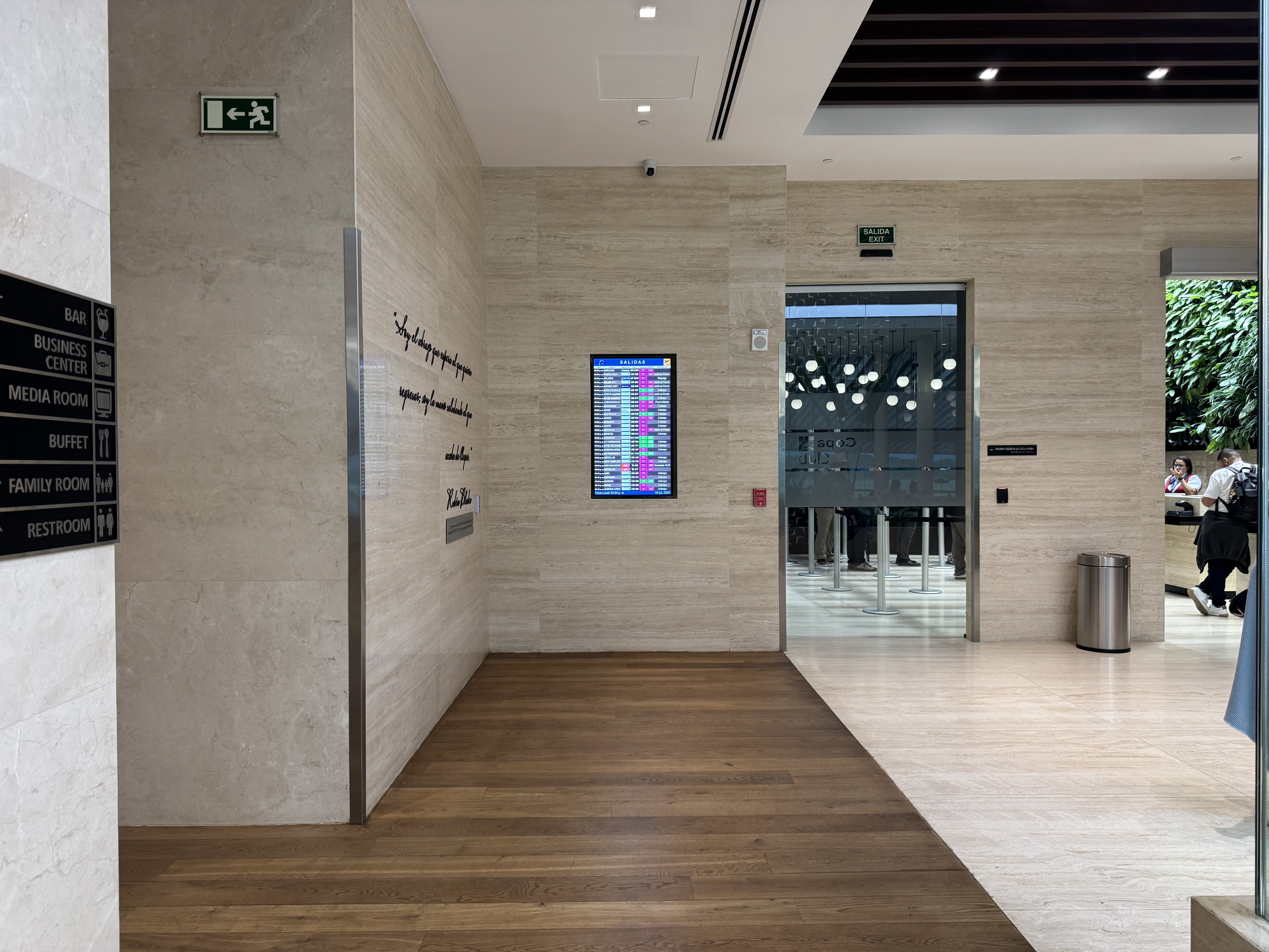 Copa Club PTY Terminal 2 departure board near entrance