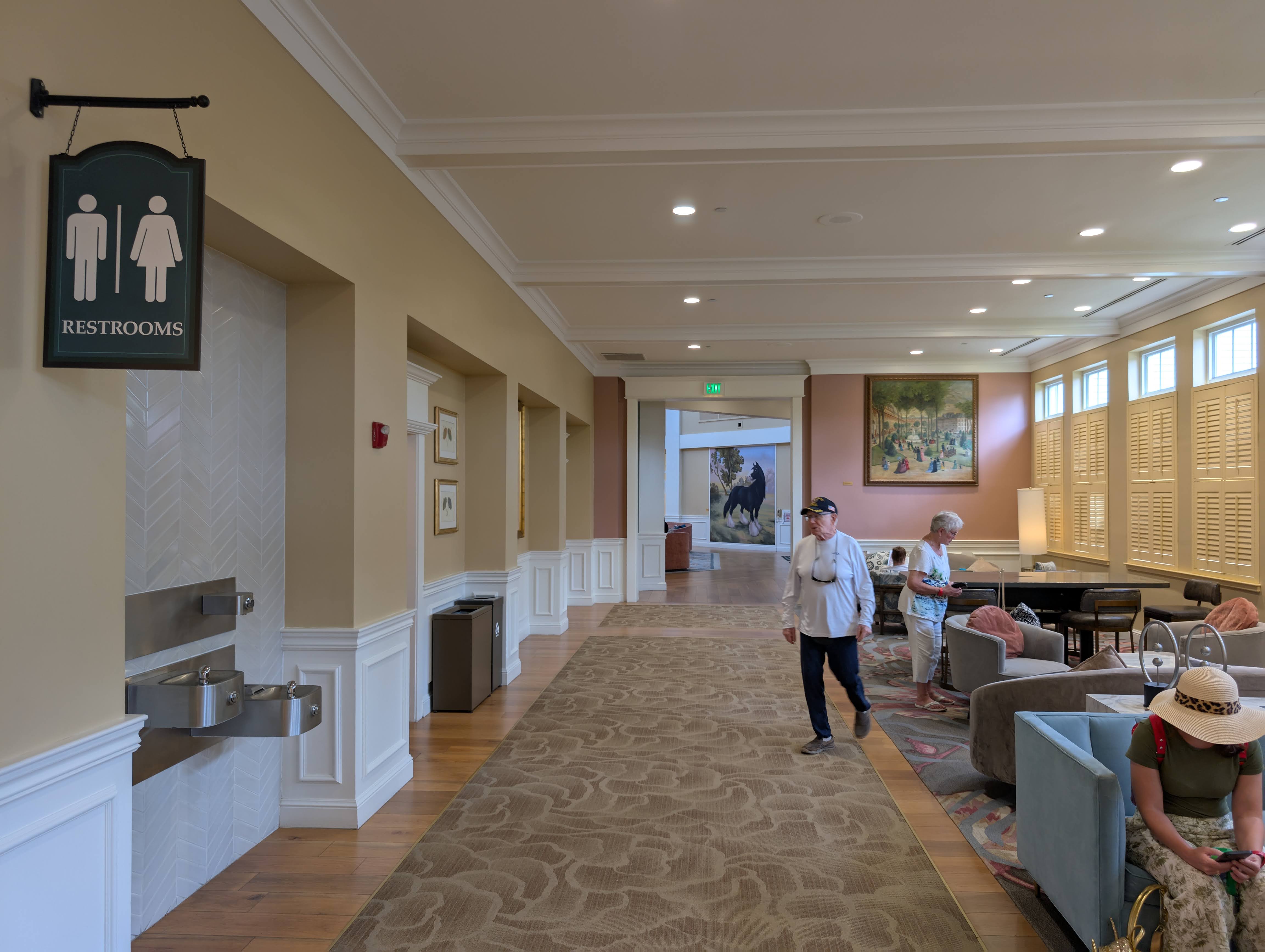 Disney’s Saratoga Springs Resort & Spa lobby restrooms and hallway to dining Disney's Saratoga Springs Resort & Spa lobby restrooms and hallway to dining