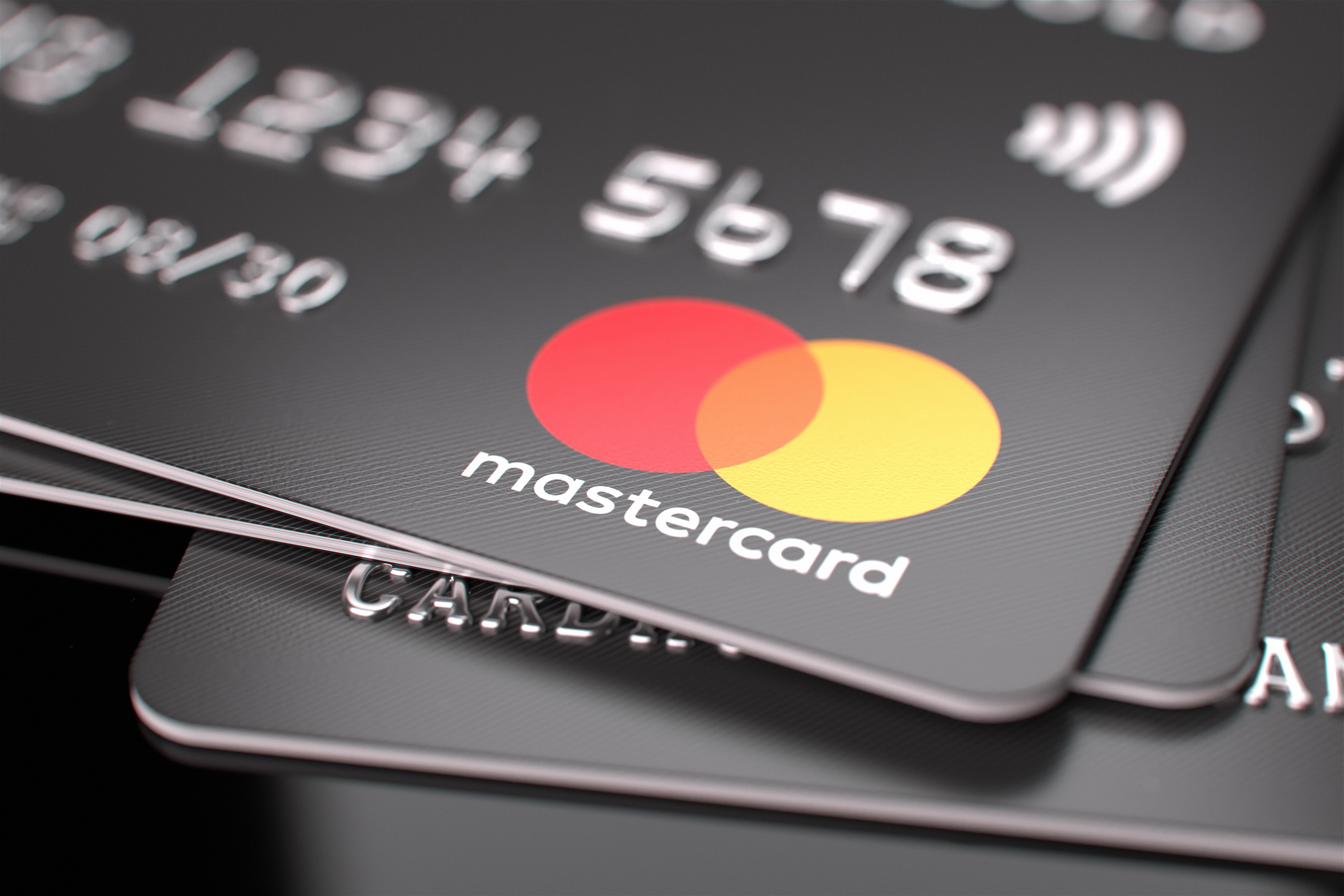 Mastercard bank cards on a table