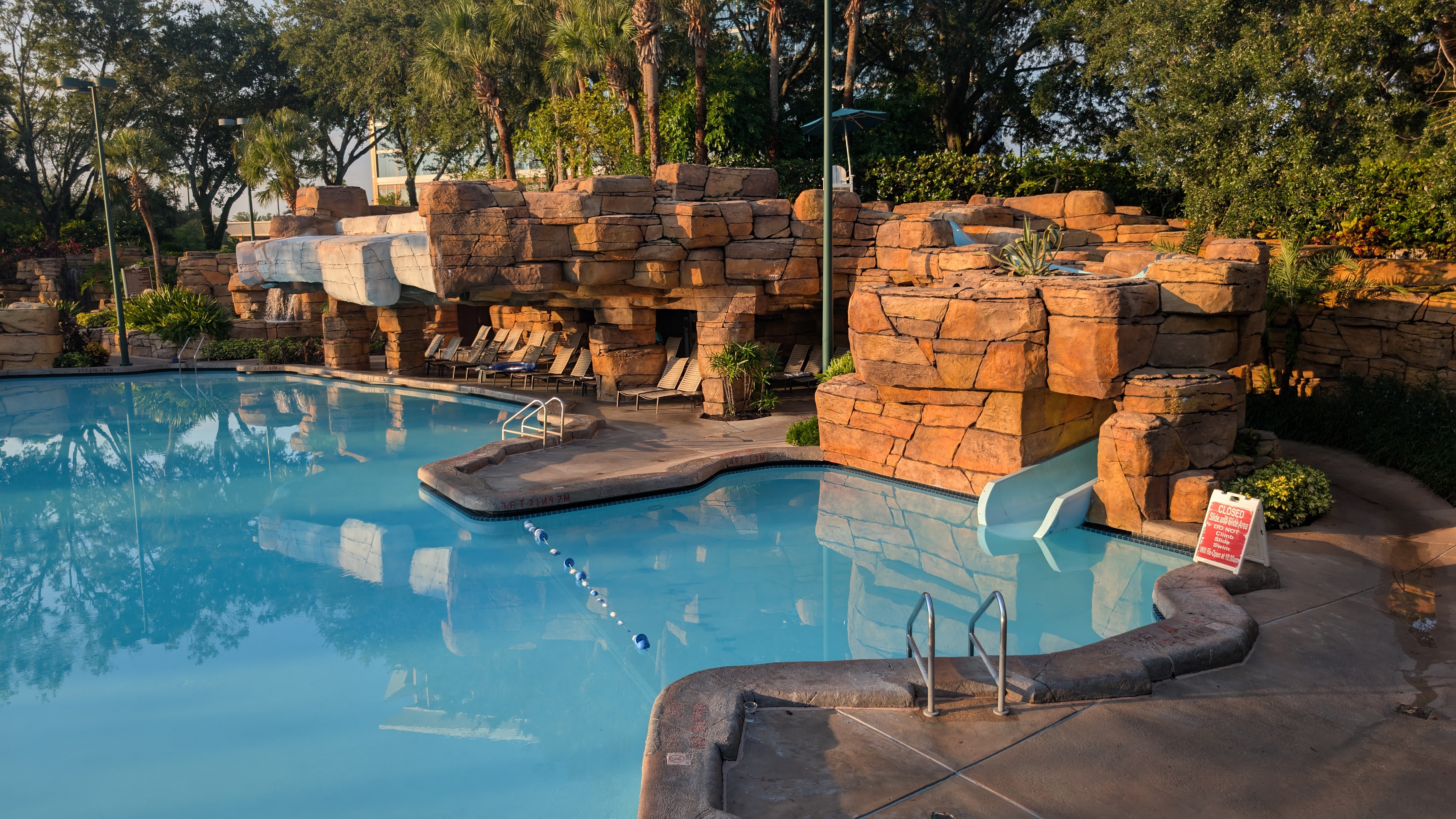 Walt Disney World Dolphin amenities pools grotto pool slide and grotto seating Walt Disney World Dolphin amenities pools grotto pool slide and grotto seating