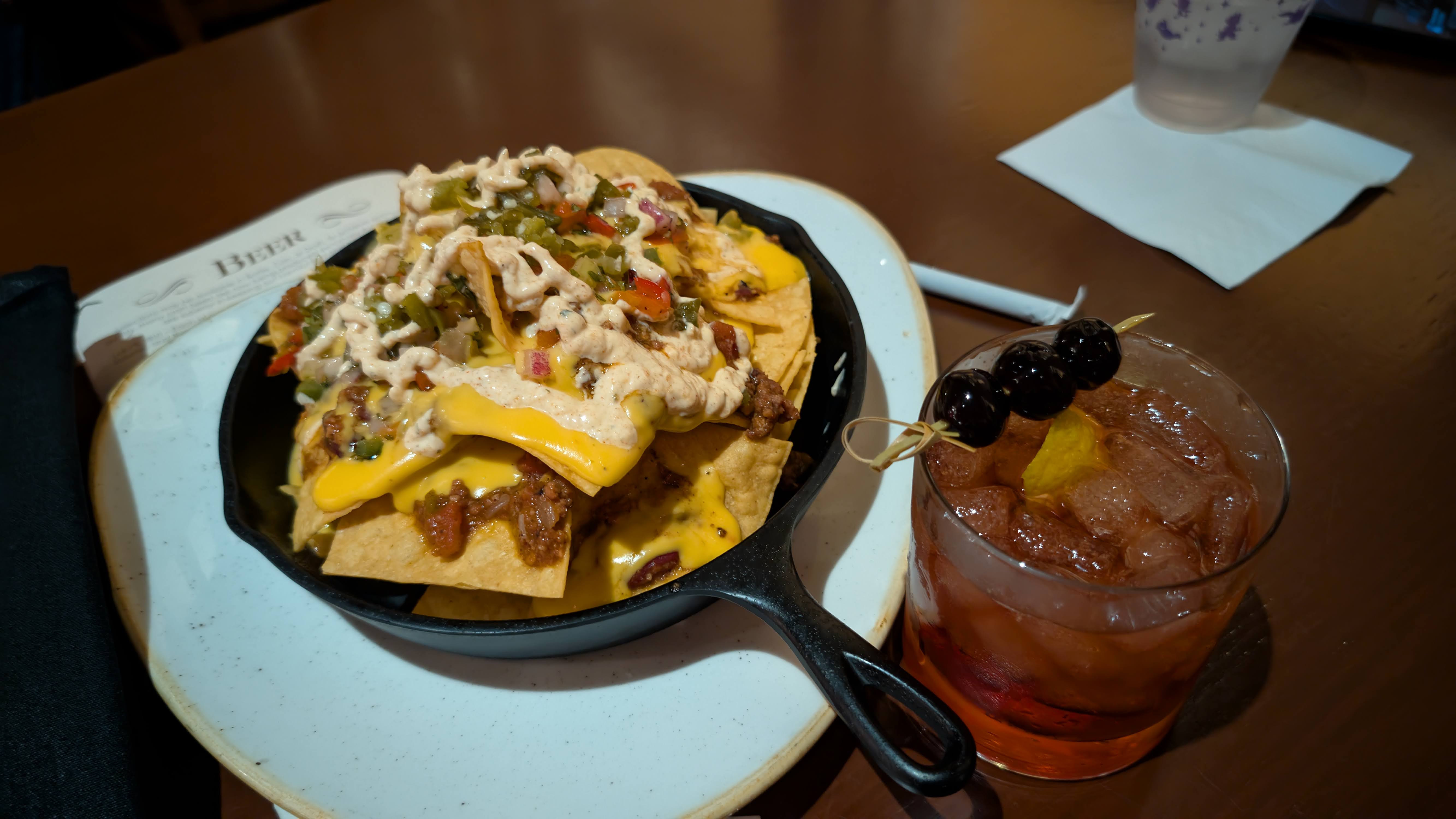 Disney’s Port Orleans Resort River Roost nachos and cocktail Disney's Port Orleans Resort River Roost nachos and cocktail