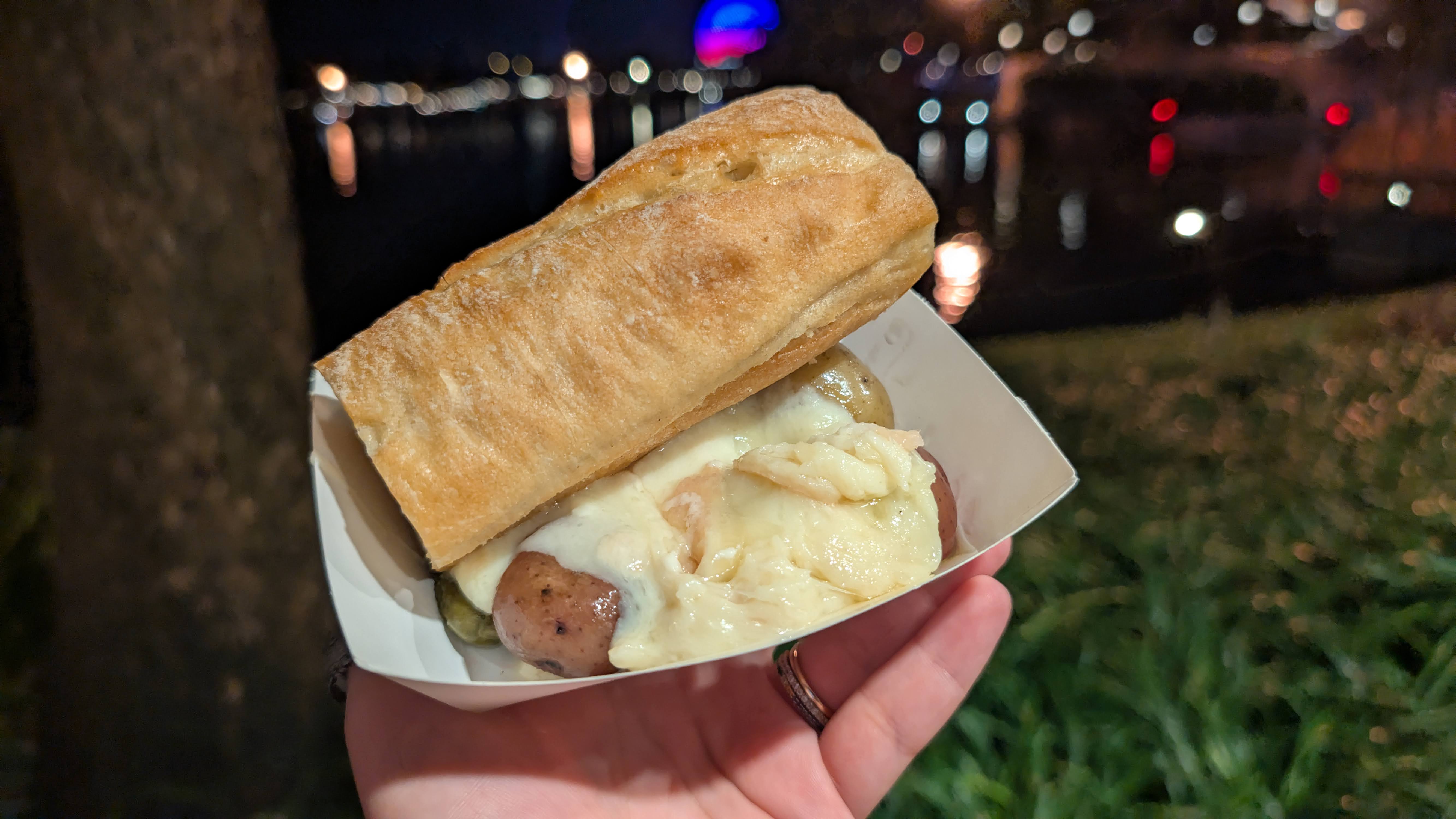 EPCOT Food & Wine Festival 2025 The Alps warm raclette Swiss cheese EPCOT Food & Wine Festival 2025 The Alps warm raclette Swiss cheese
