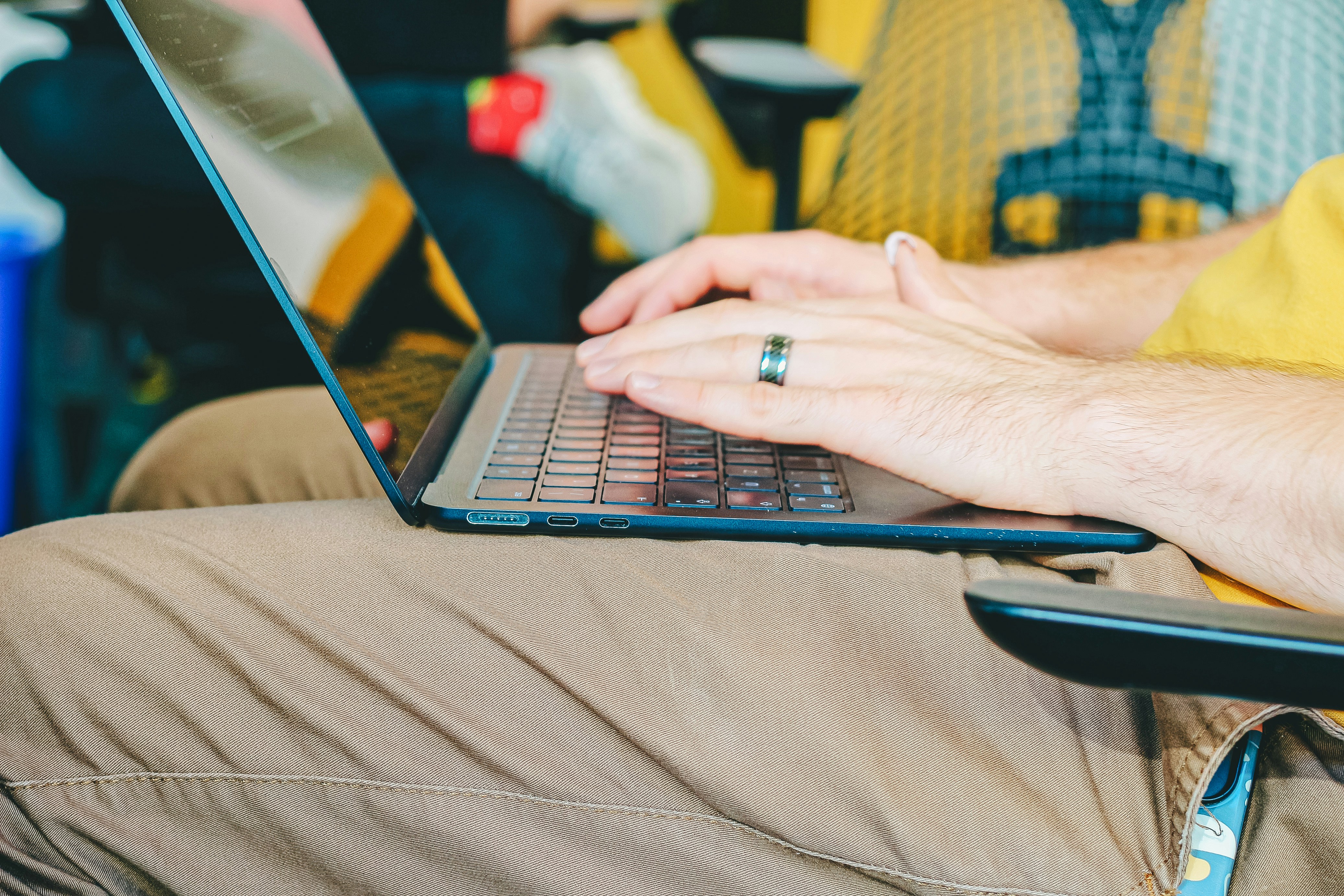 Person typing on a laptop