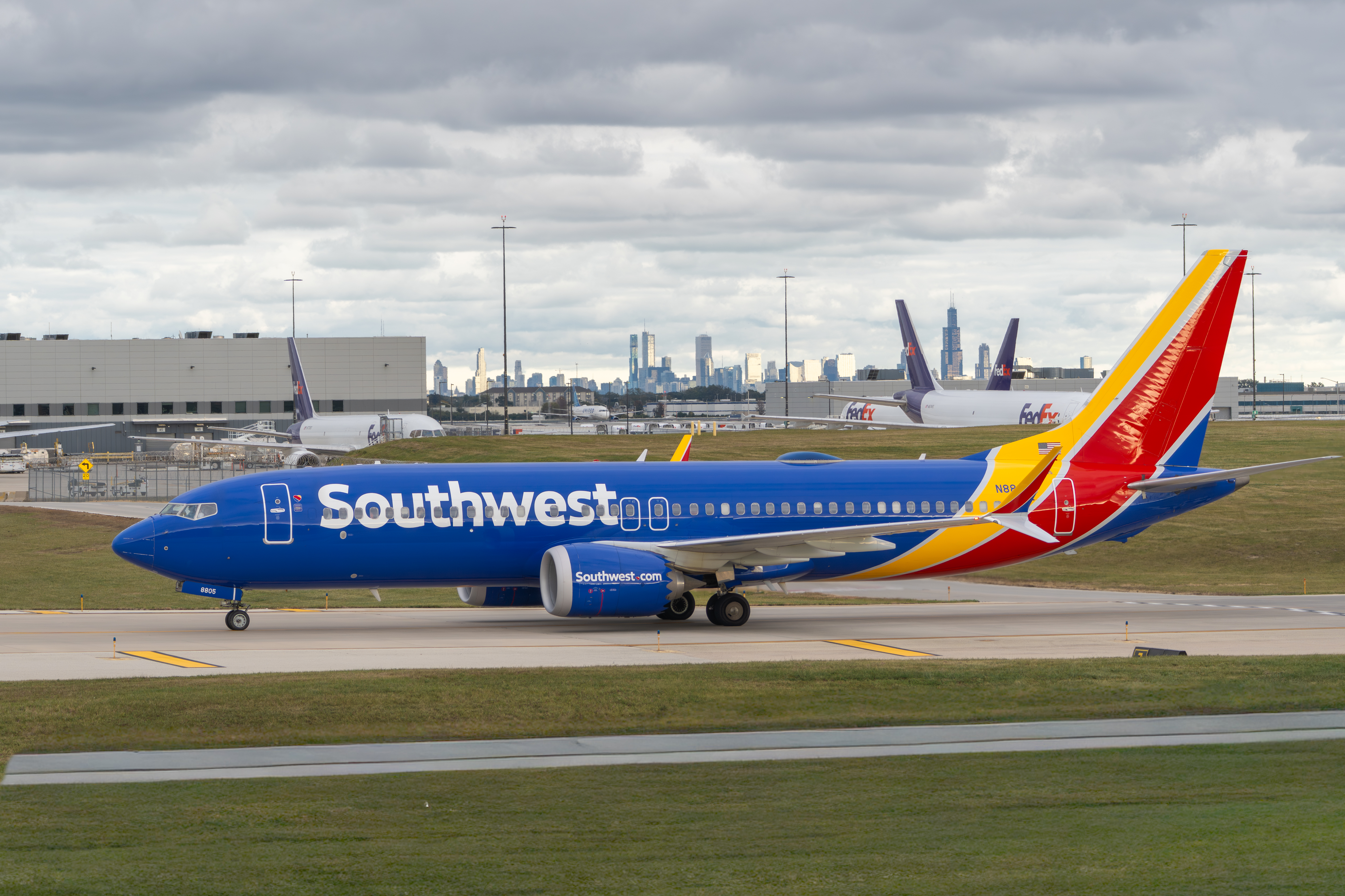 Southwest Airlines Boeing 737 Max 8 Chicago skyline in back