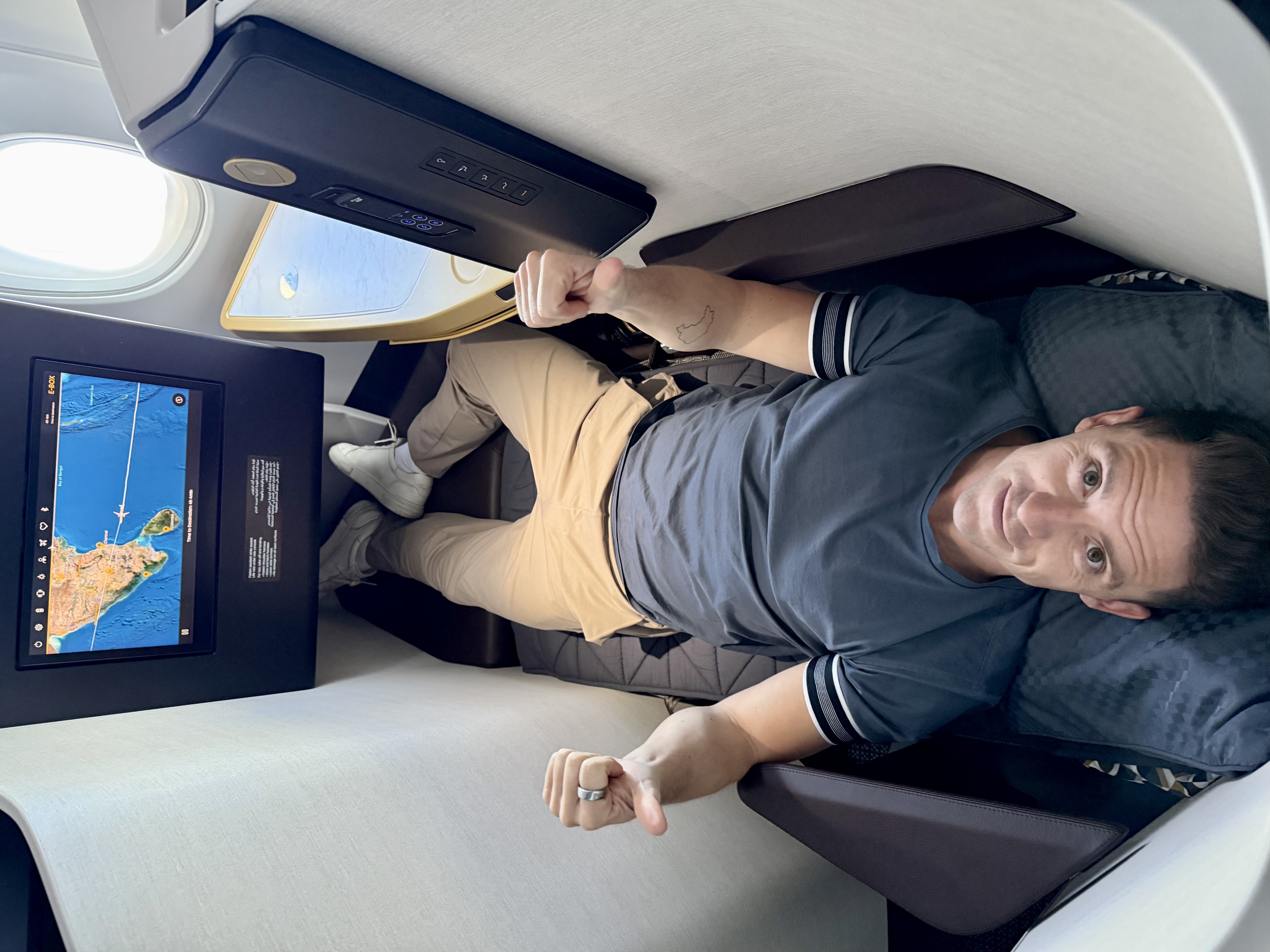 Thumbs up for the lie flat seat in business class on Etihads Airbus A321LR