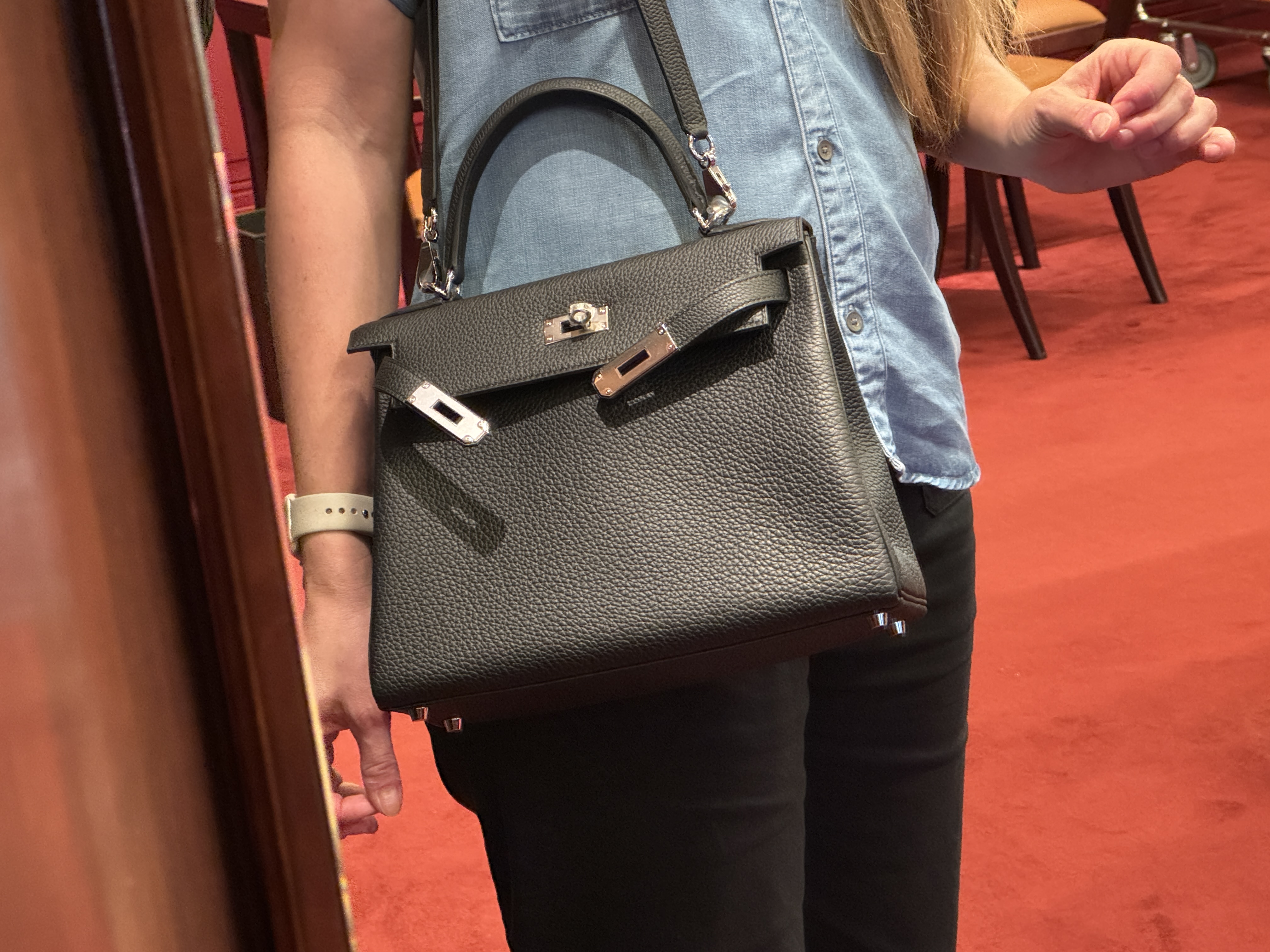 Hermes Paris trying on bag Hermes Paris trying on bag