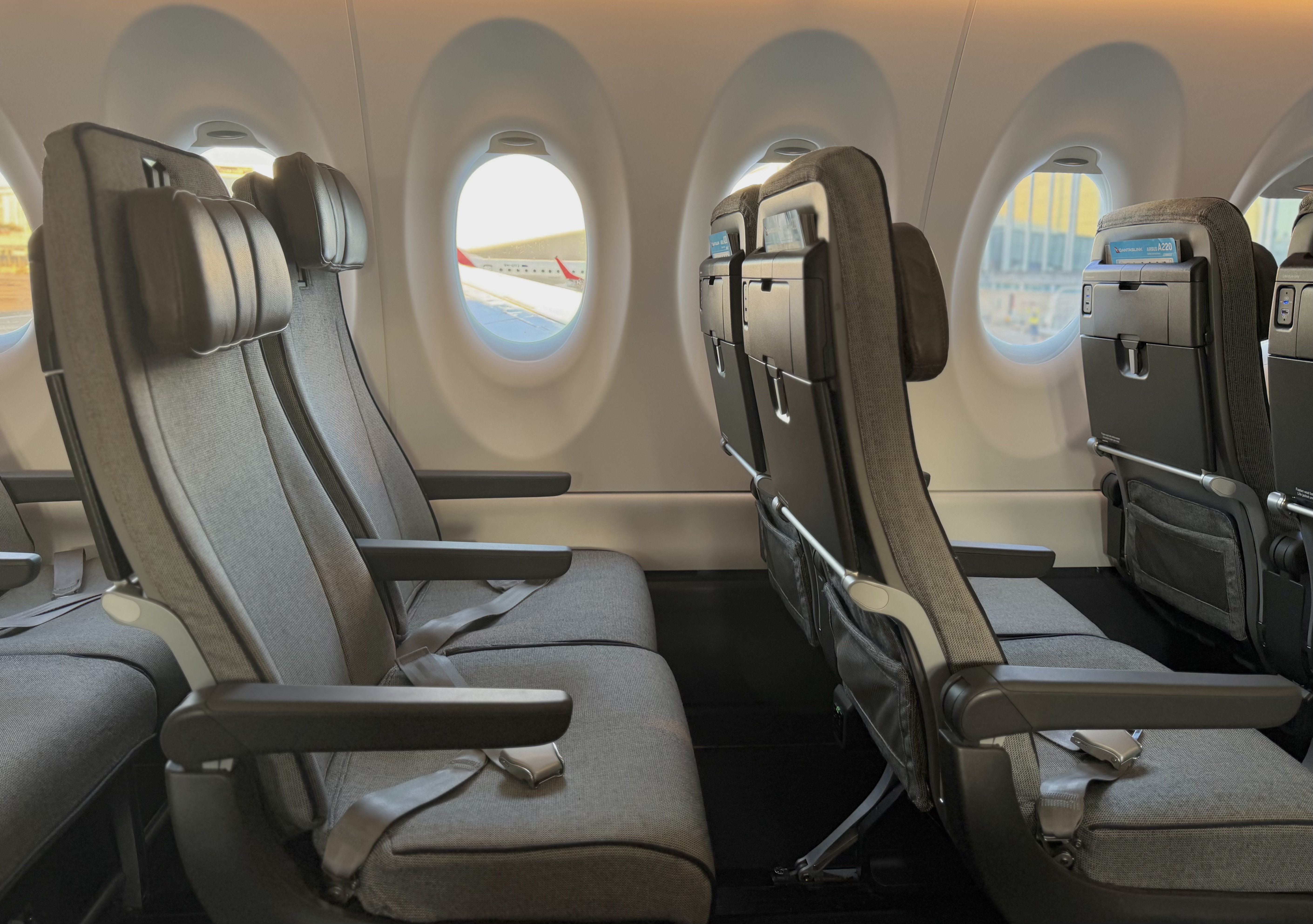 Qantas Airbus A220 economy cabin right side leg room Qantas Airbus A220 economy cabin right side leg room