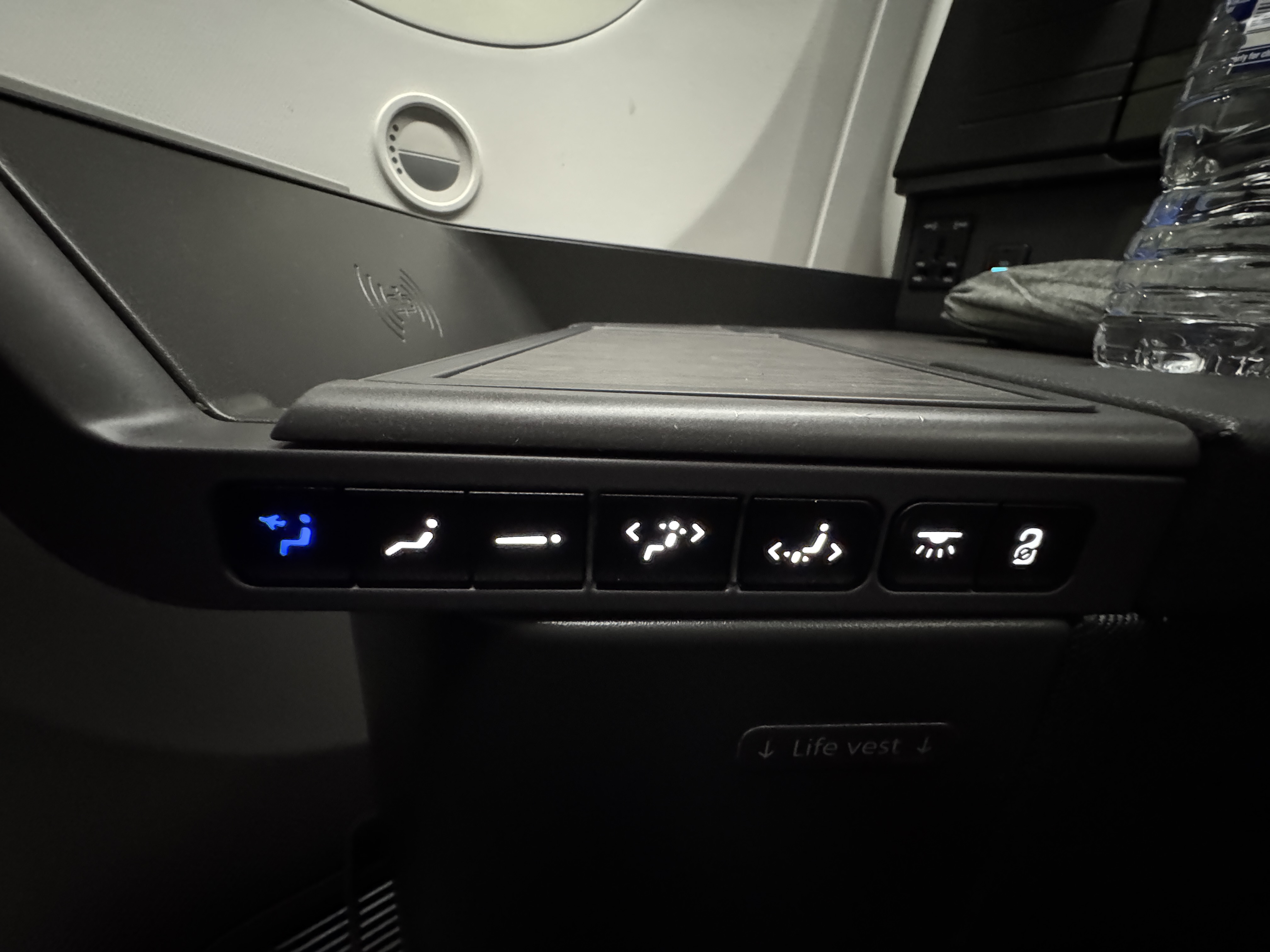 AA Flagship Suite Business Class touchscreen controls seat