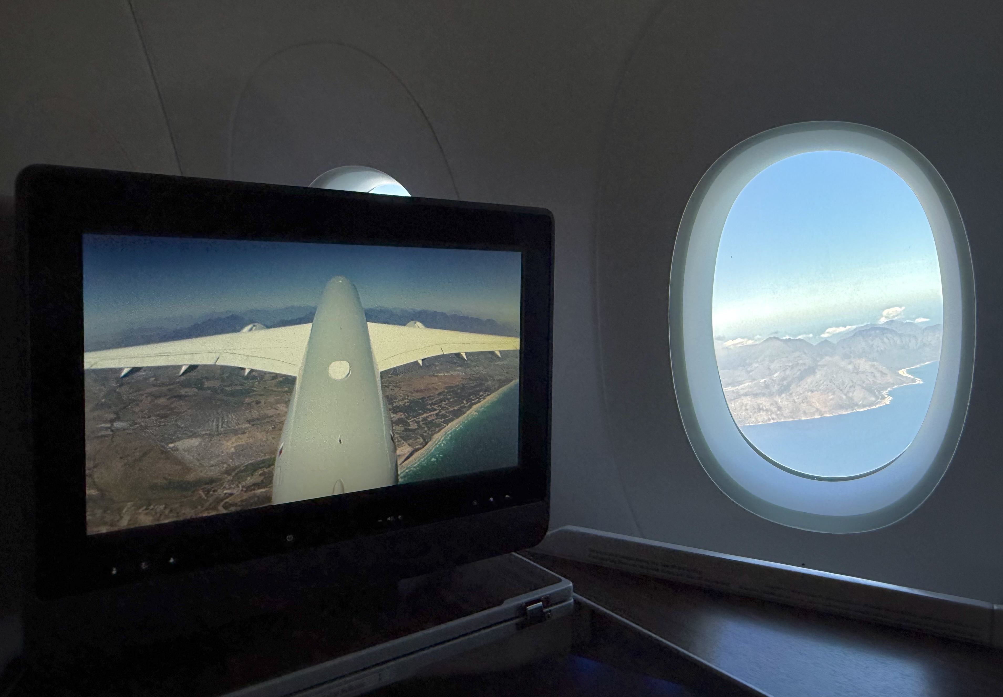 Qatar Airways Airbus A350900 business class camera flying