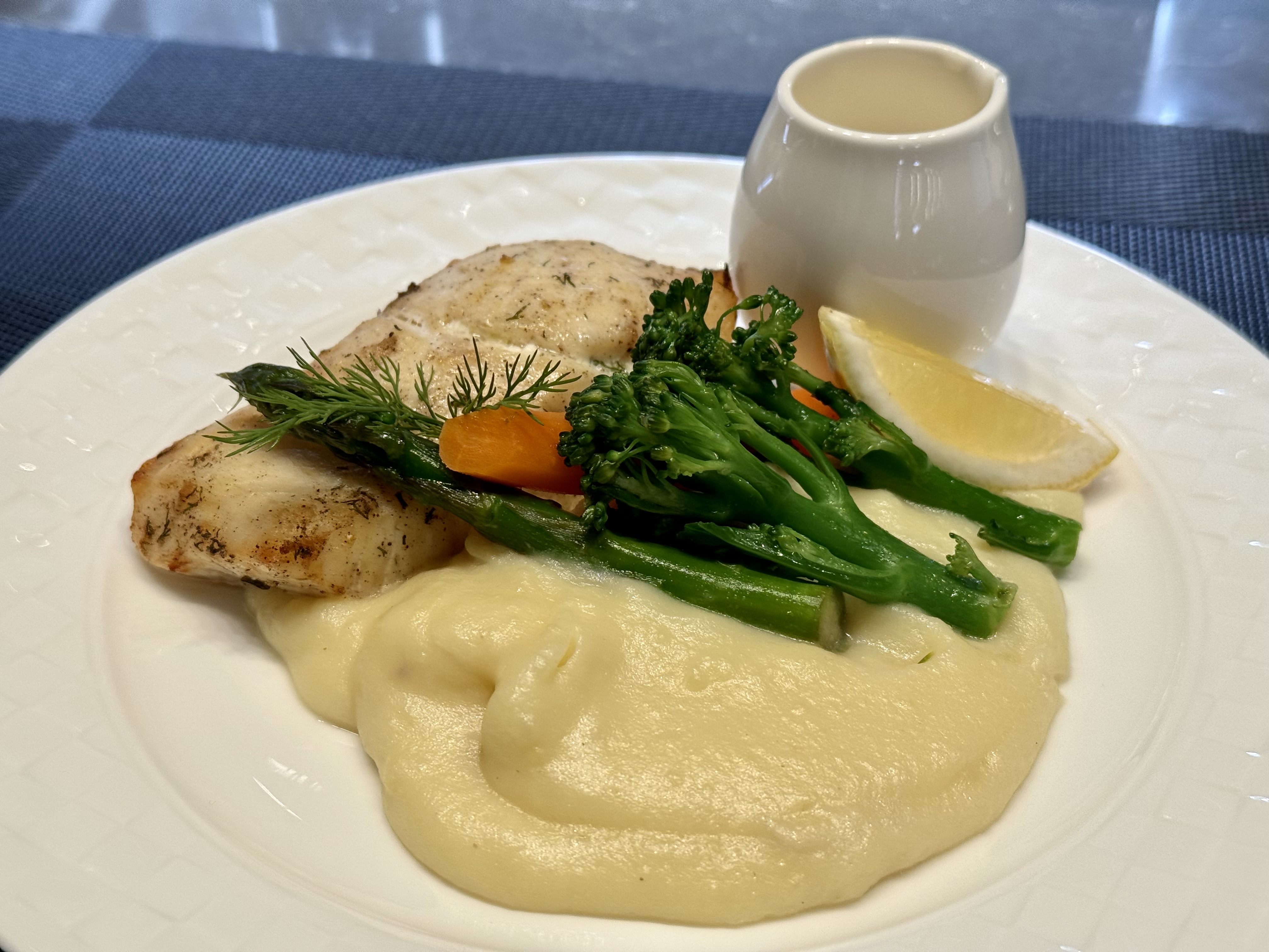 Qatar Airways Al Mourjan Lounge fish dish Qatar Airways Al Mourjan Lounge fish dish