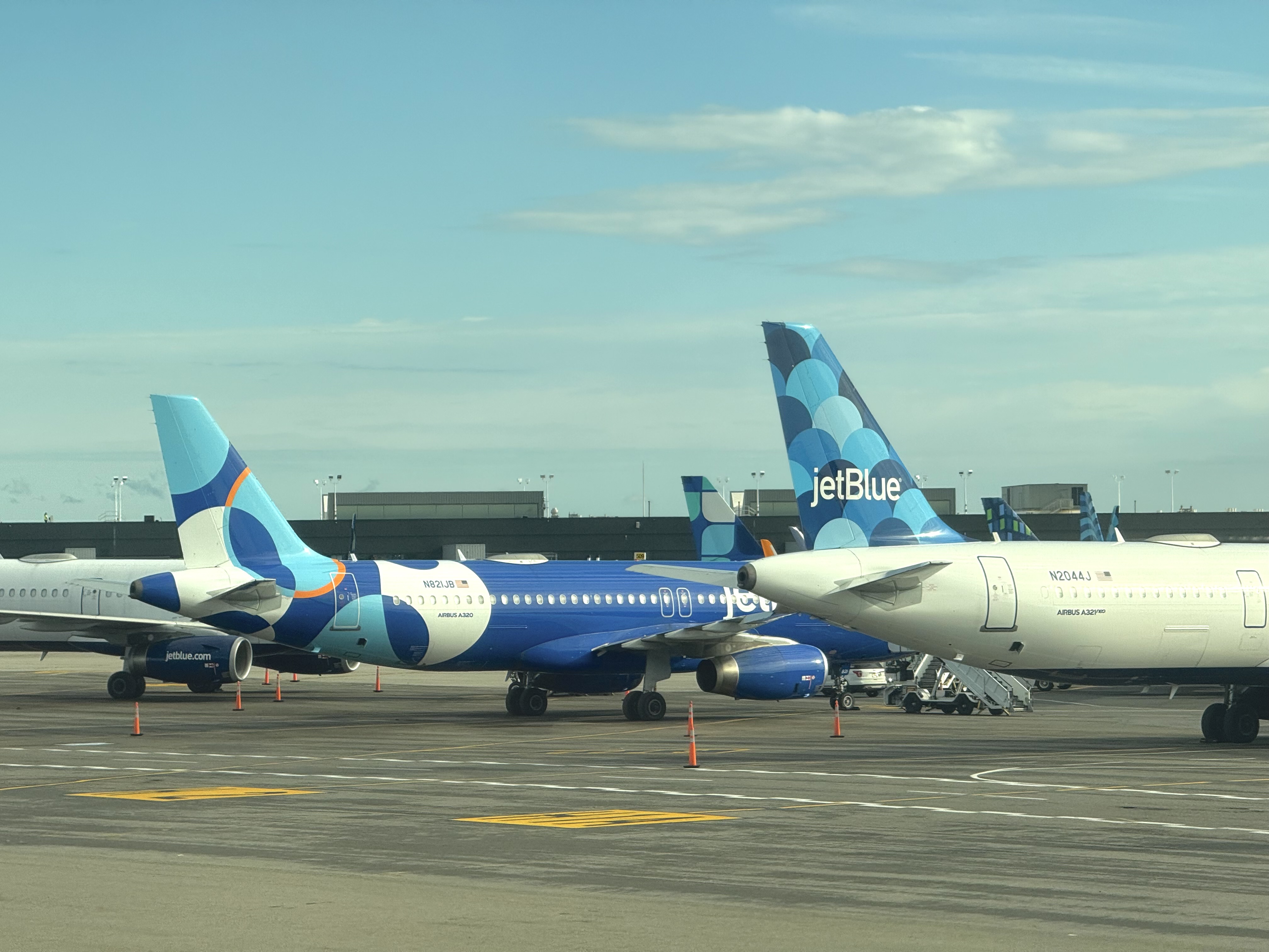 JetBlue planes at New York JFK airport JetBlue planes at New York JFK airport