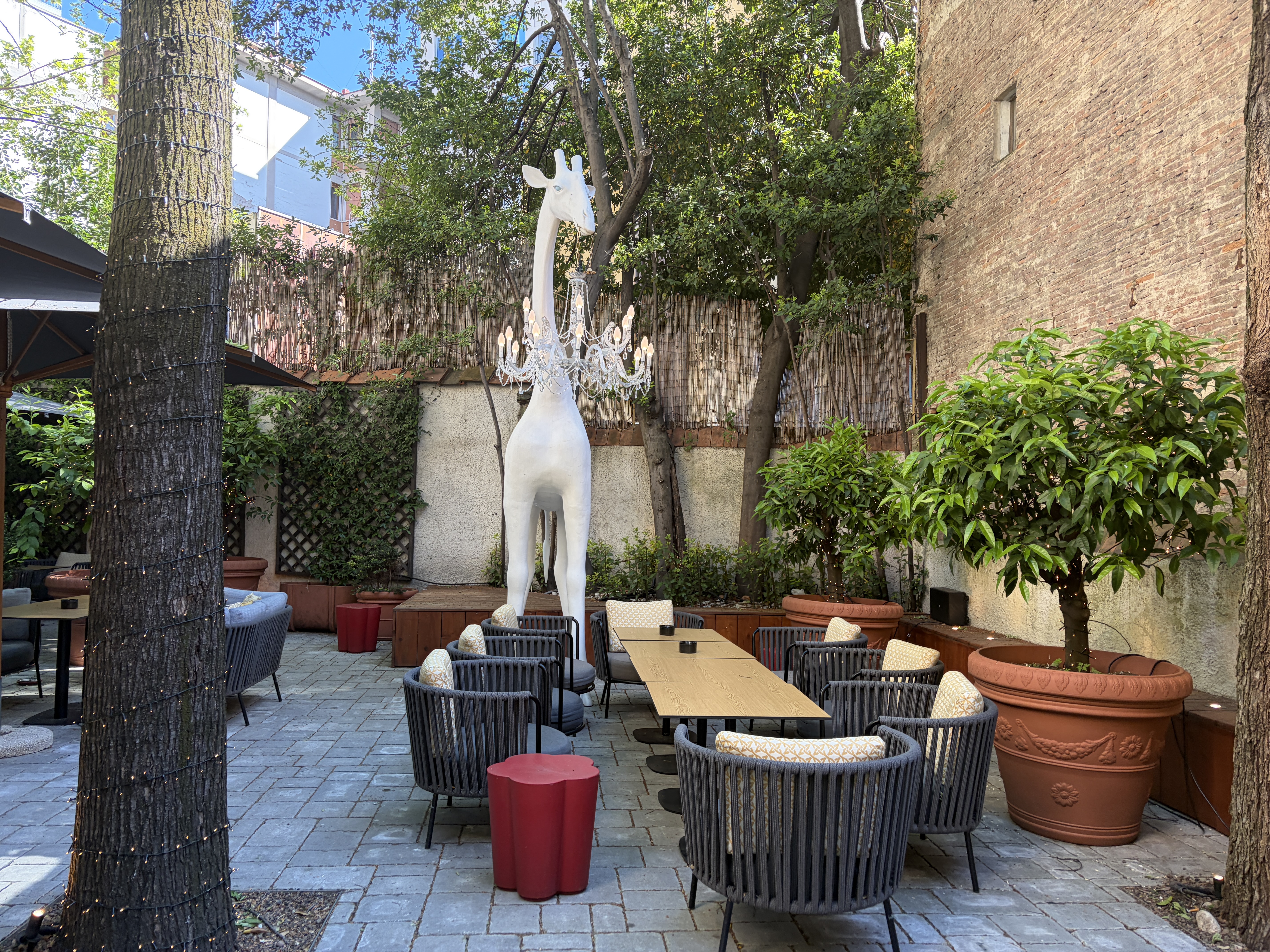 Backyard seating at the Hotel Indigo Florence