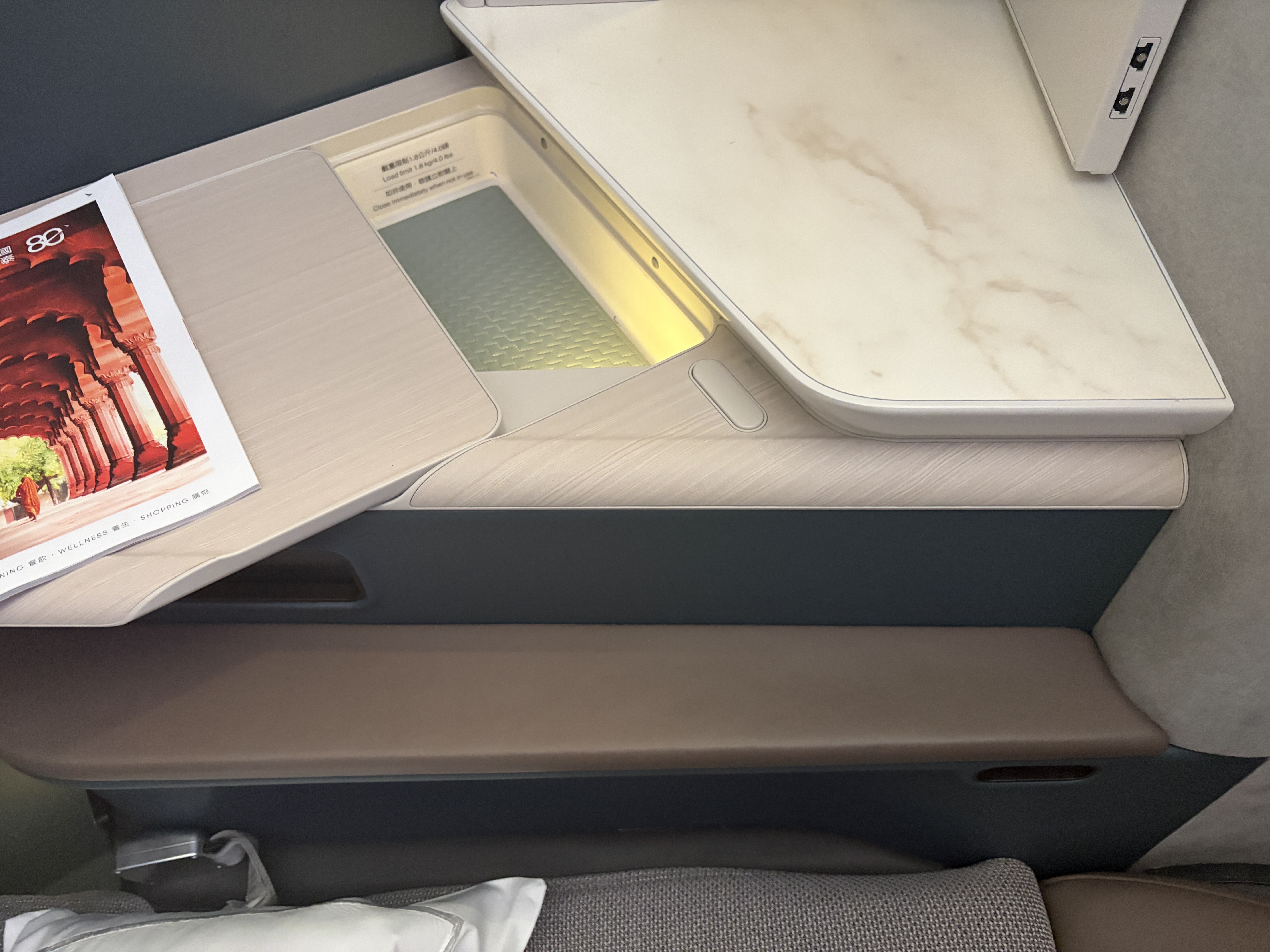 Cathay Pacific Aria Suites storage compartments