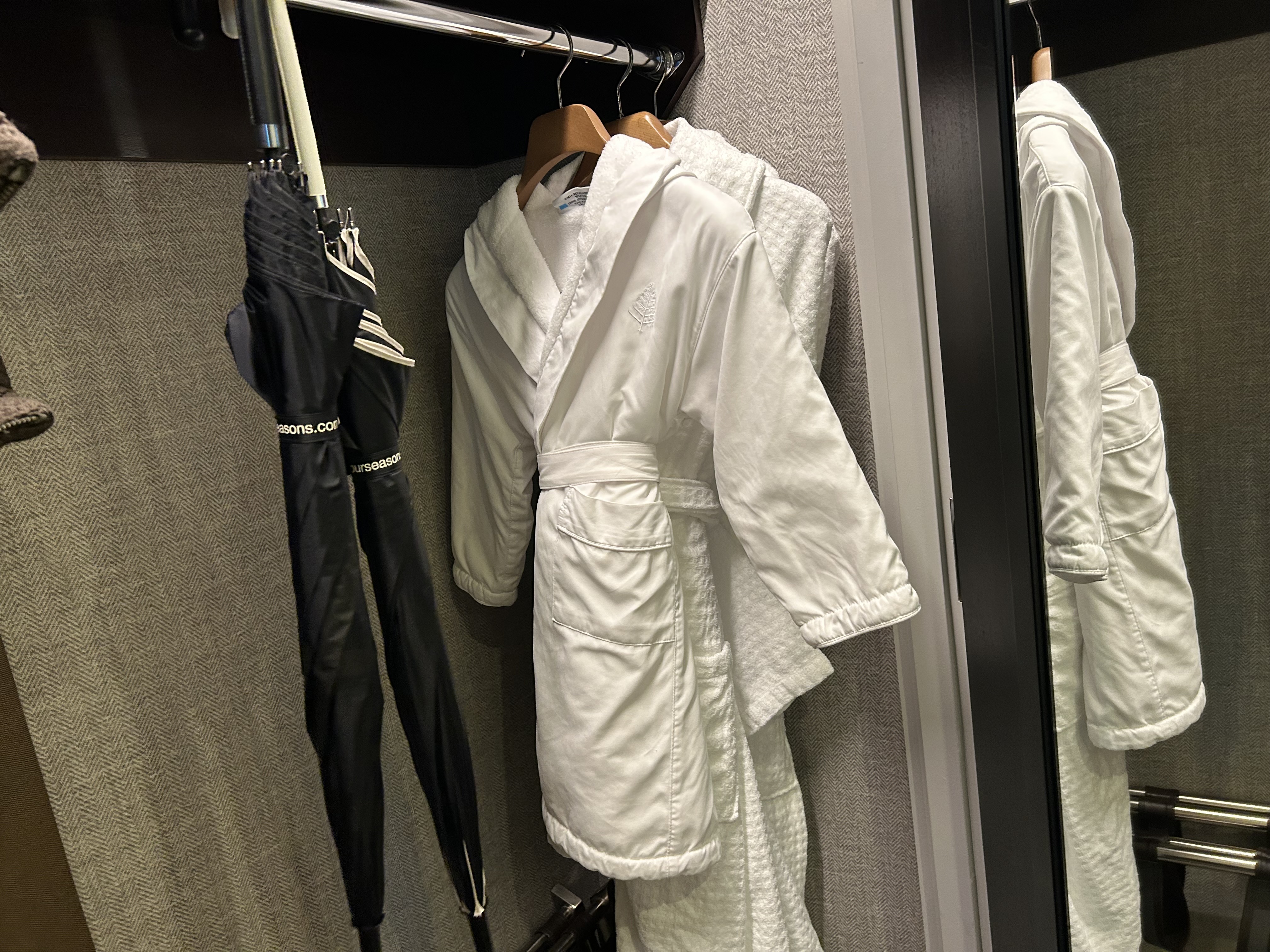 Four Seasons One Dalton Boston room 1502 robes umbrella