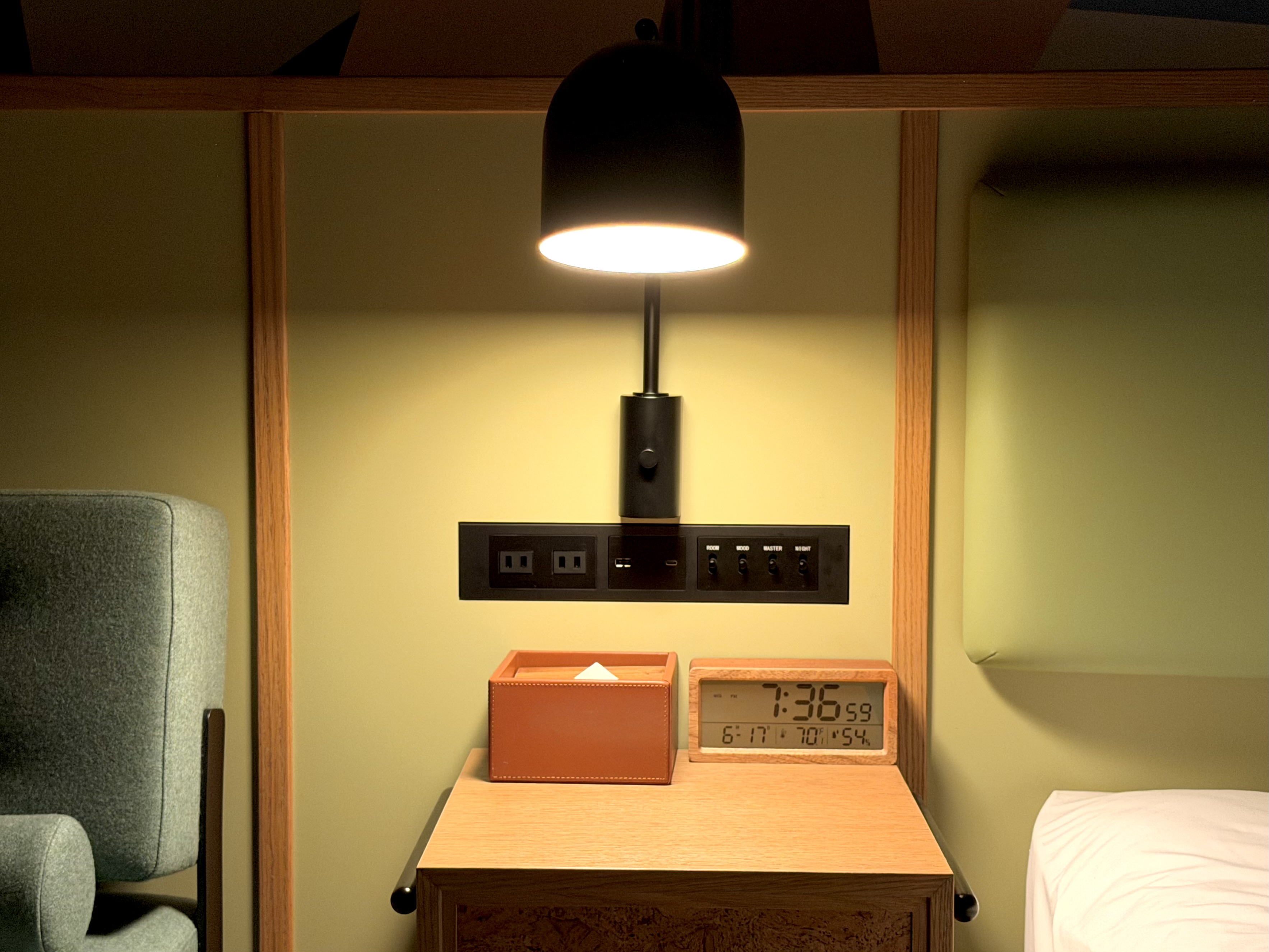 Caption by Hyatt Kabutocho Tokyo bedside table at night
