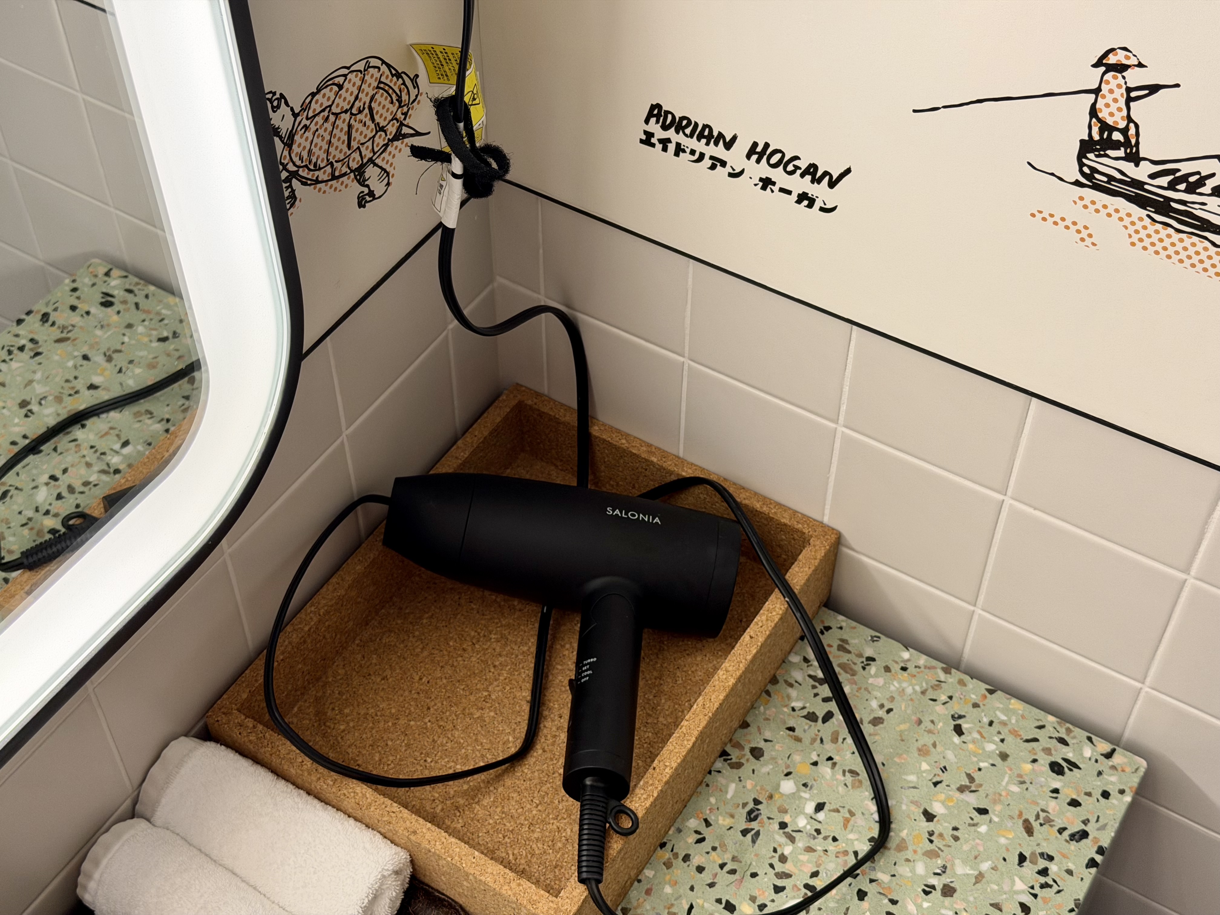 Caption by Hyatt Kabutocho Tokyo hairdryer and art