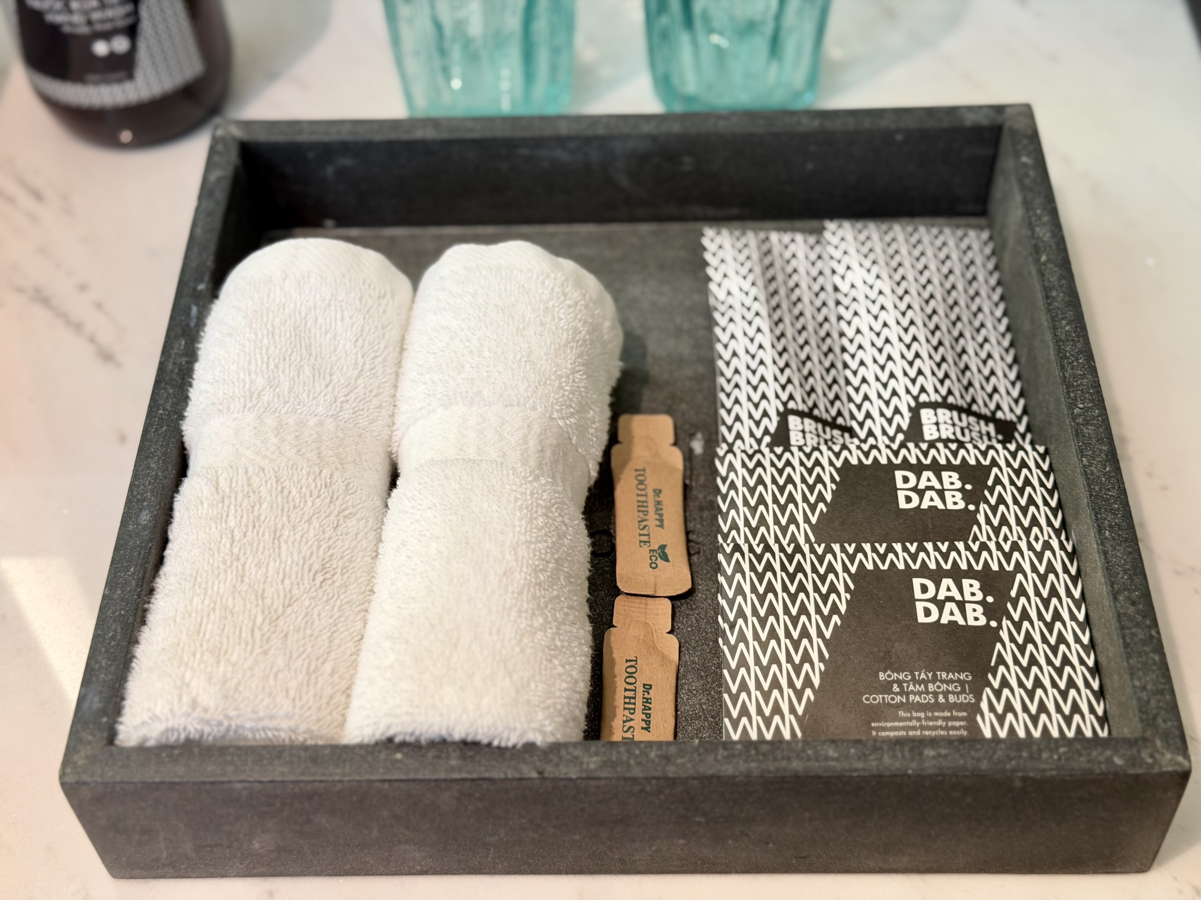 Wink Danang Riverside room bathroom amenities close up