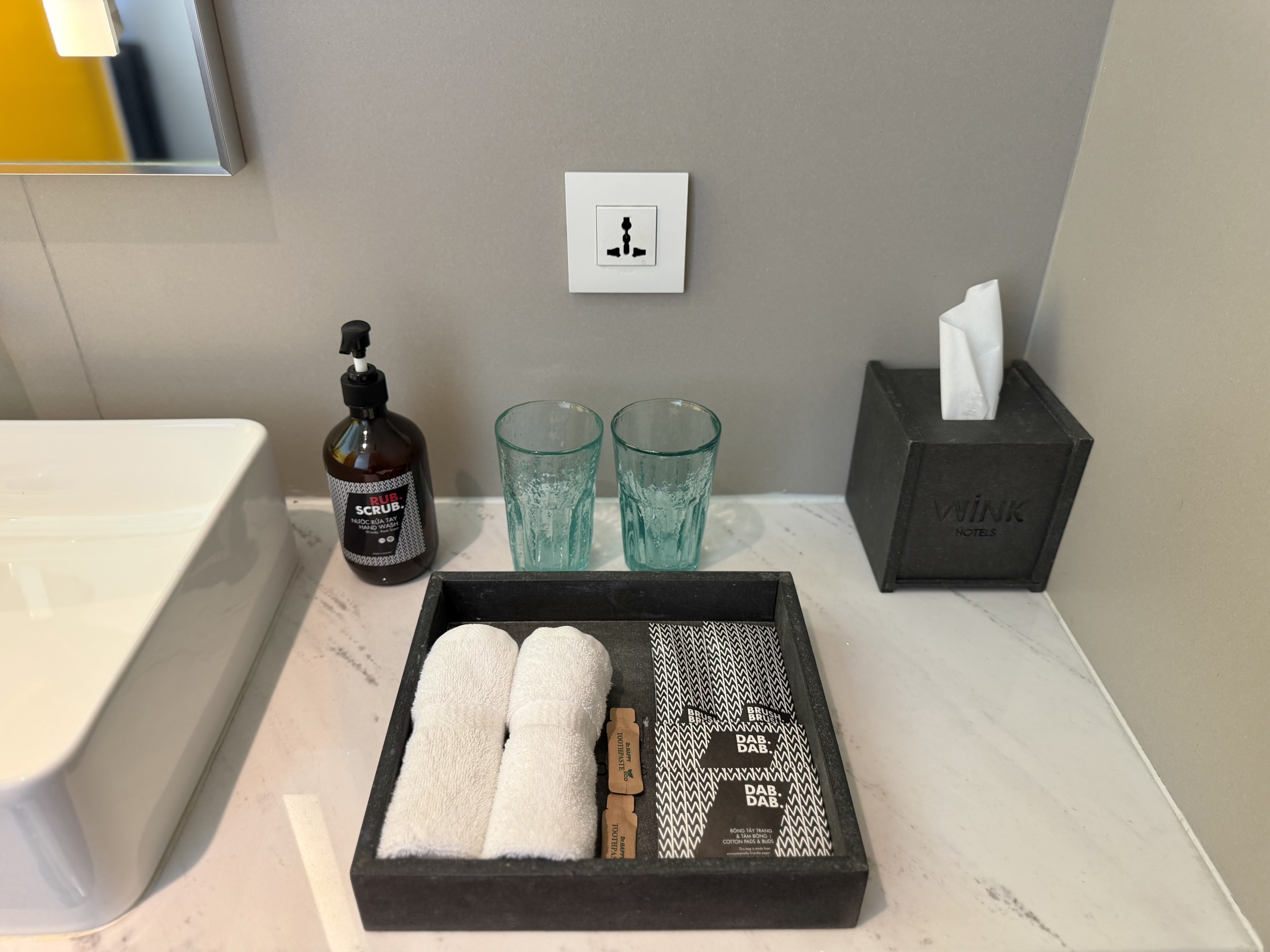 Wink Danang Riverside room bathroom amenities