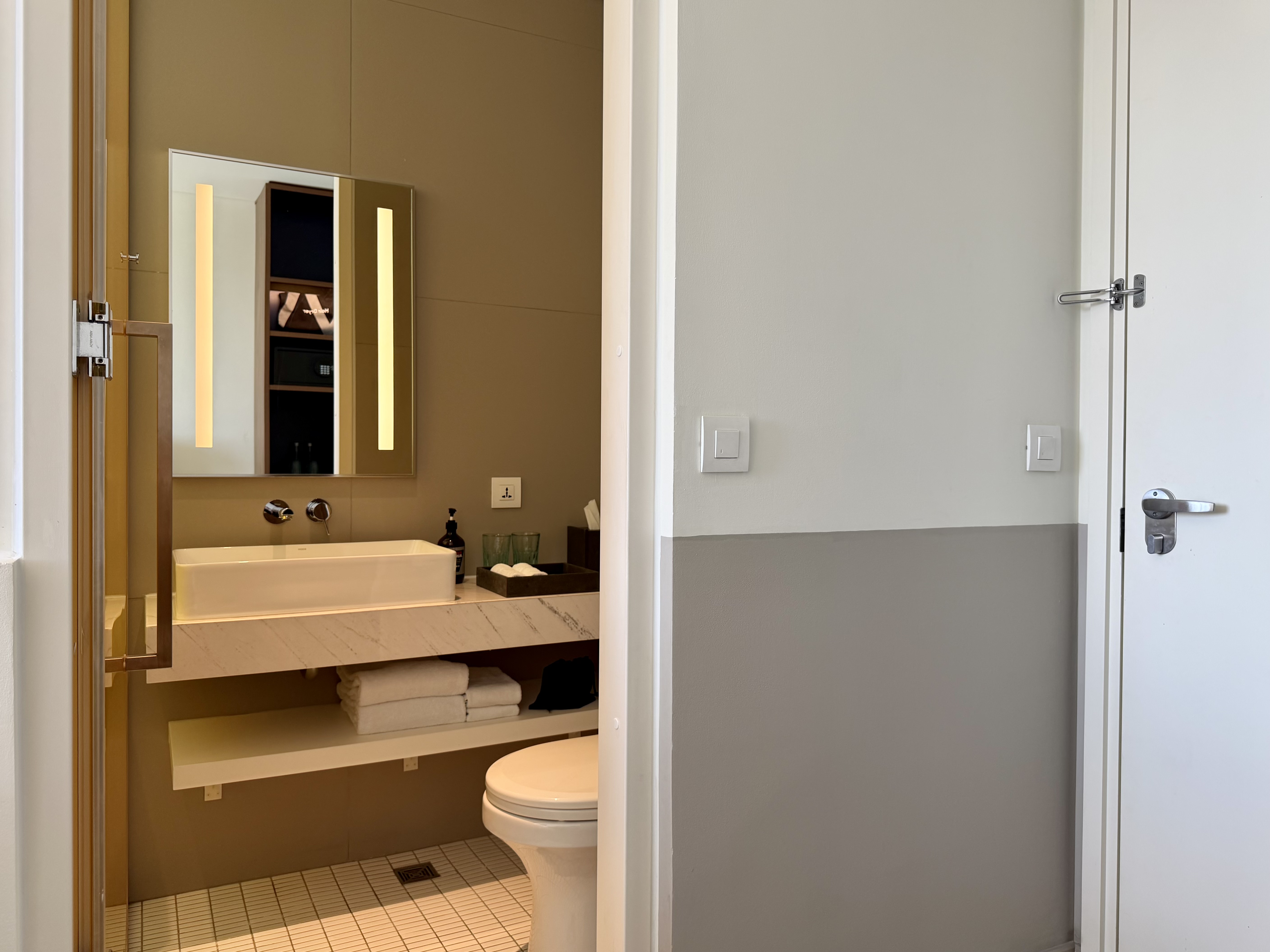 Wink Danang Riverside room bathroom entrance